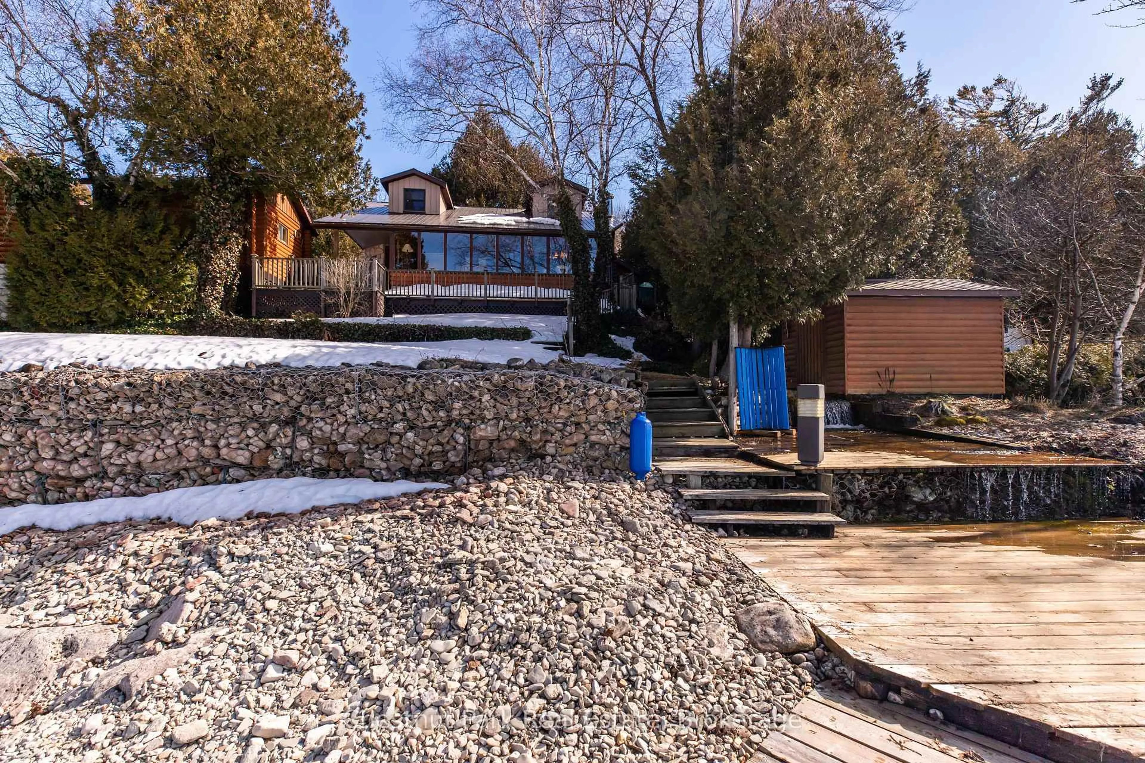 A pic from outside/outdoor area/front of a property/back of a property/a pic from drone, unknown for 36 William St, Northern Bruce Peninsula Ontario N0H 1W0