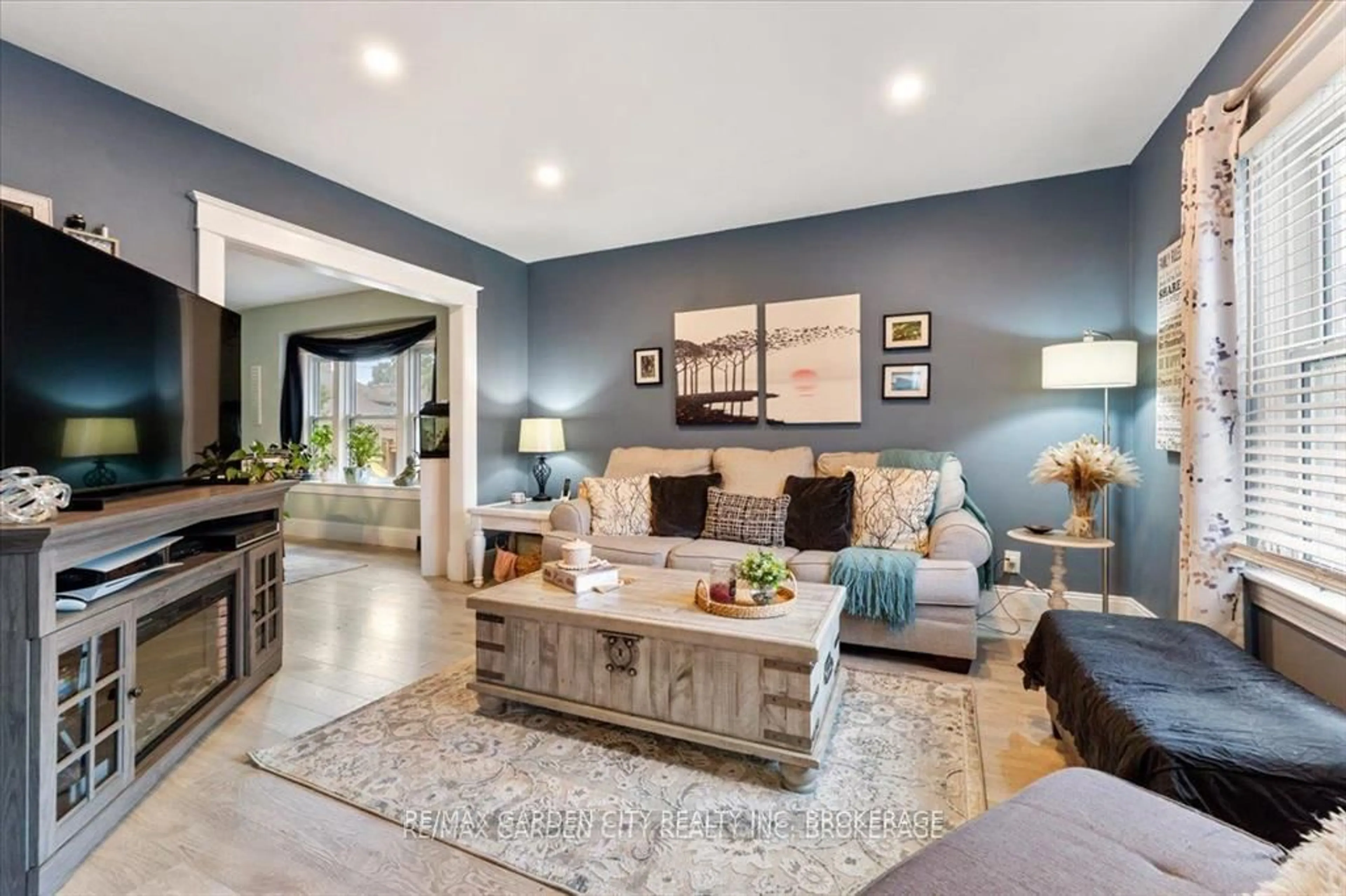 Living room with furniture, unknown for 22 Chaplin Ave, St. Catharines Ontario L2R 2E6