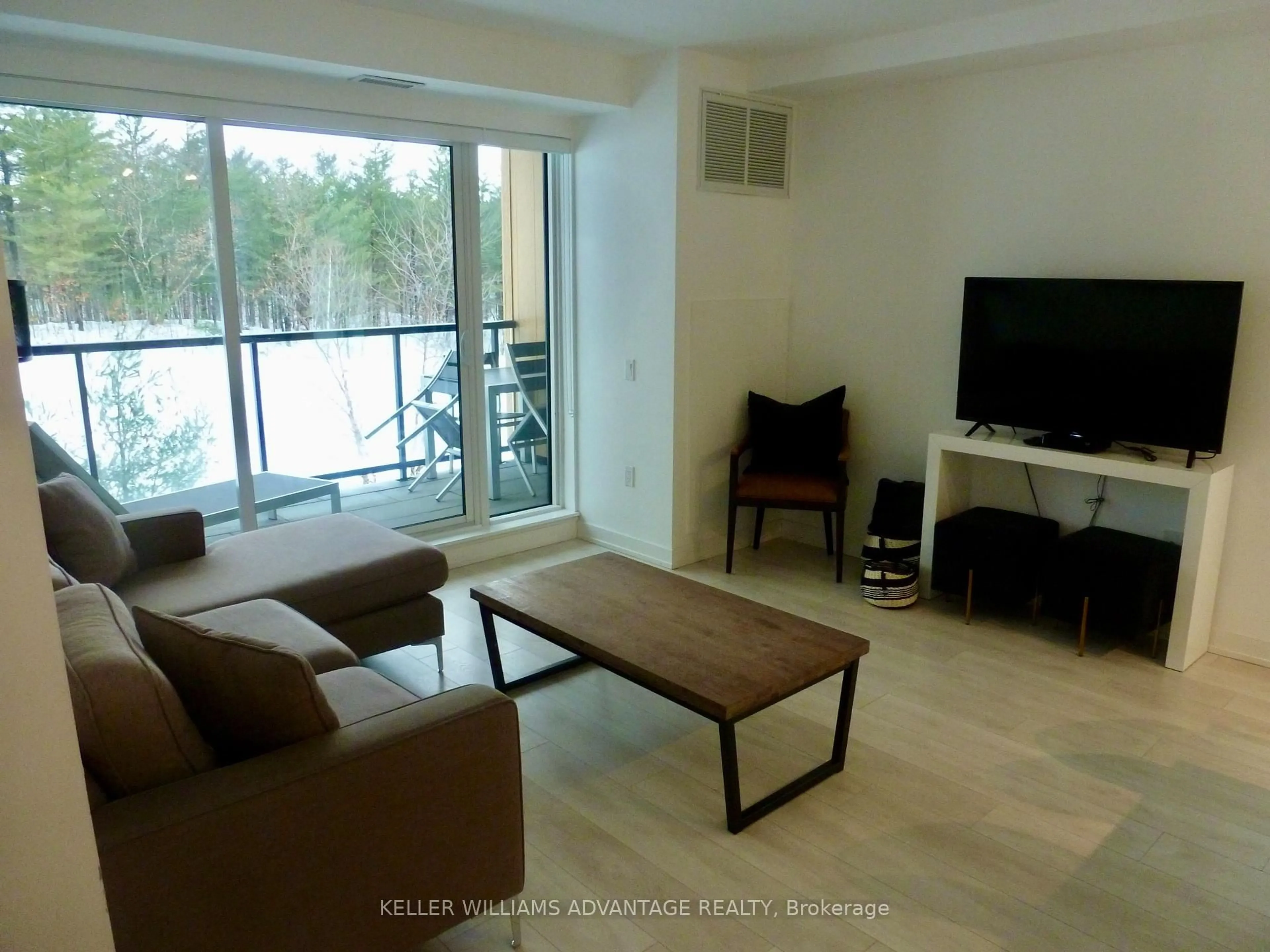 Living room with furniture, unknown for 120 CARRICK Tr #201, Gravenhurst Ontario P1P 0B6