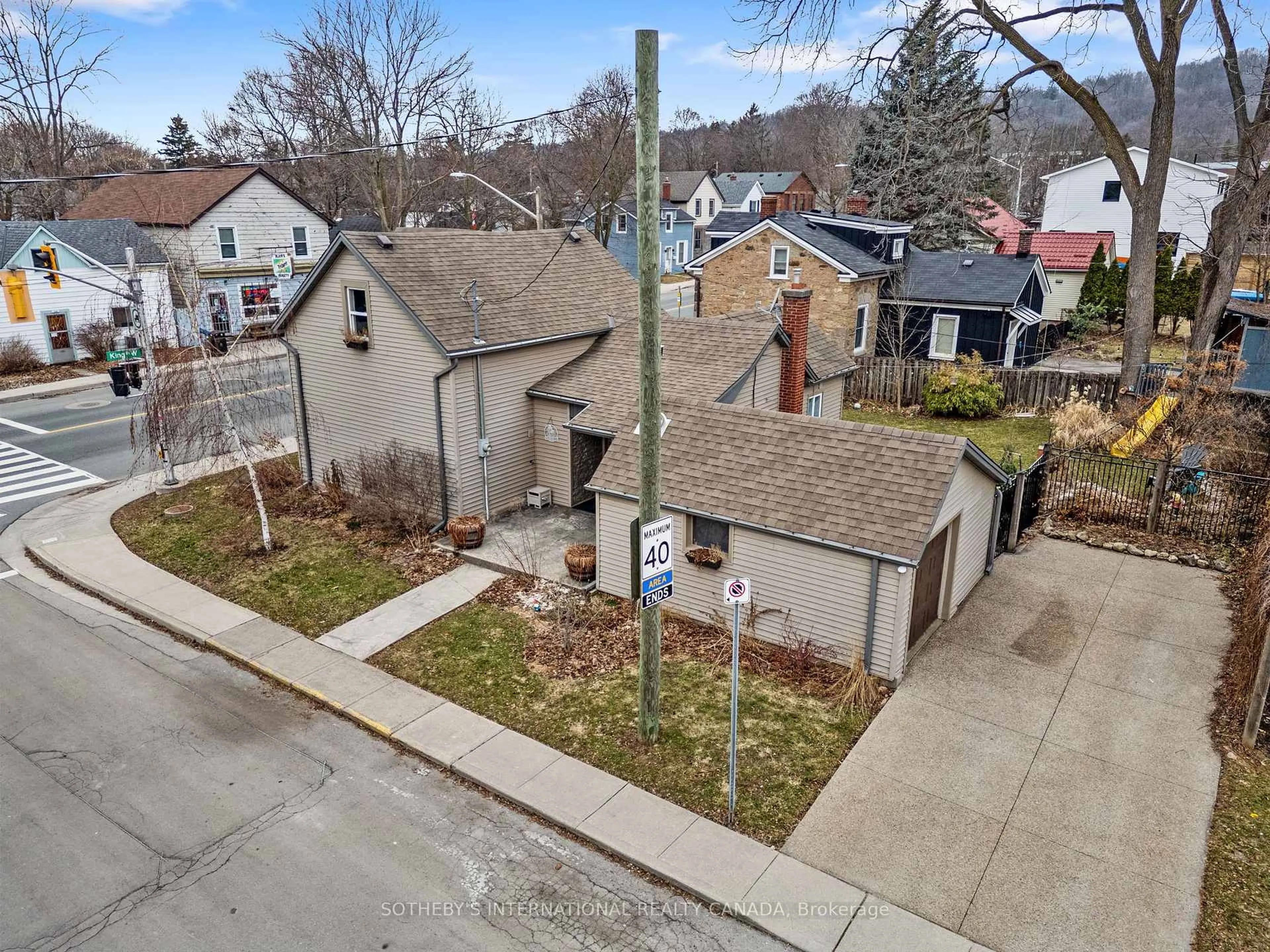 A pic from outside/outdoor area/front of a property/back of a property/a pic from drone, street for 287 King St, Hamilton Ontario L9H 1W3