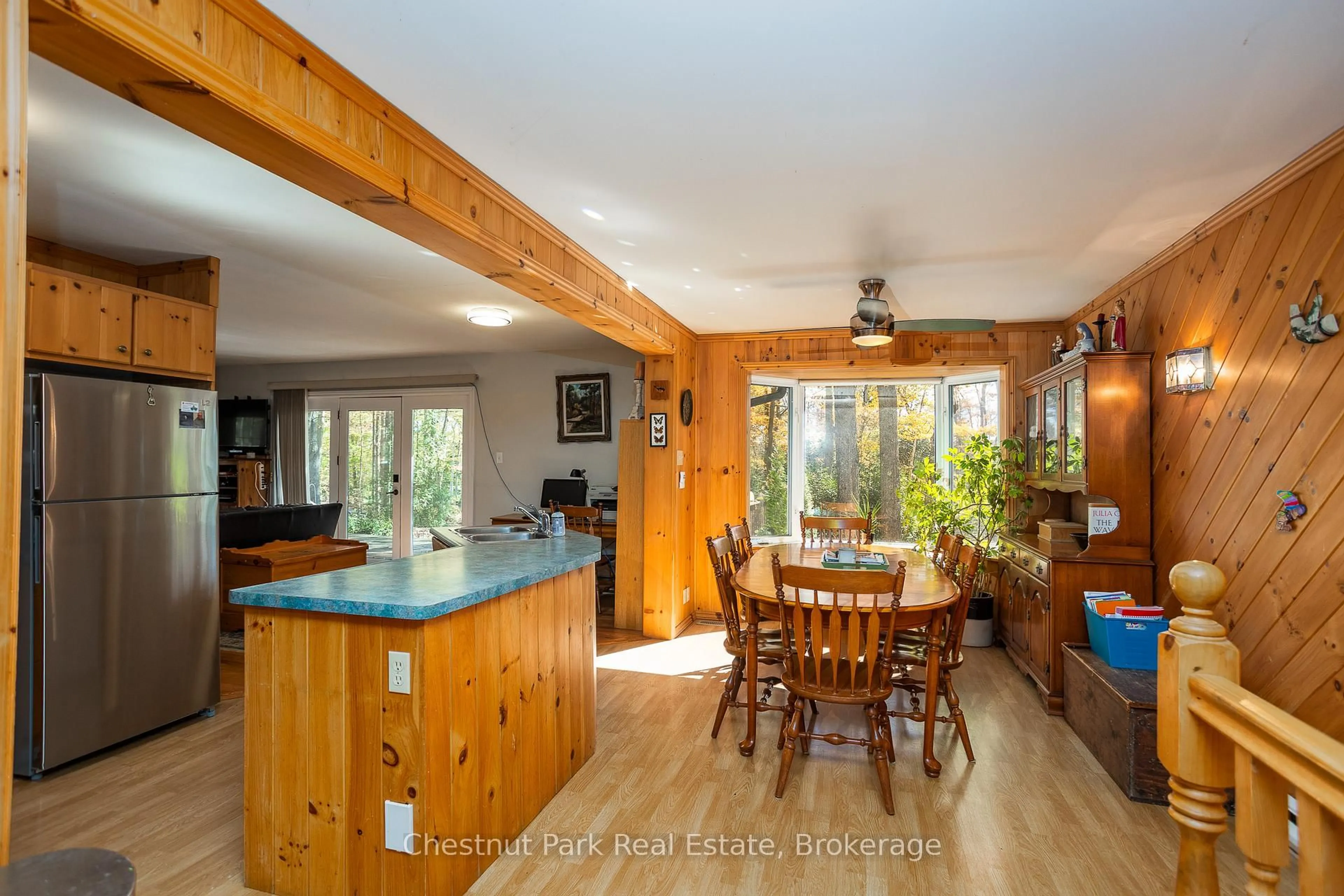 Open concept kitchen, wood/laminate floor for 305 Barney's Blvd, Northern Bruce Peninsula Ontario N0H 1Z0