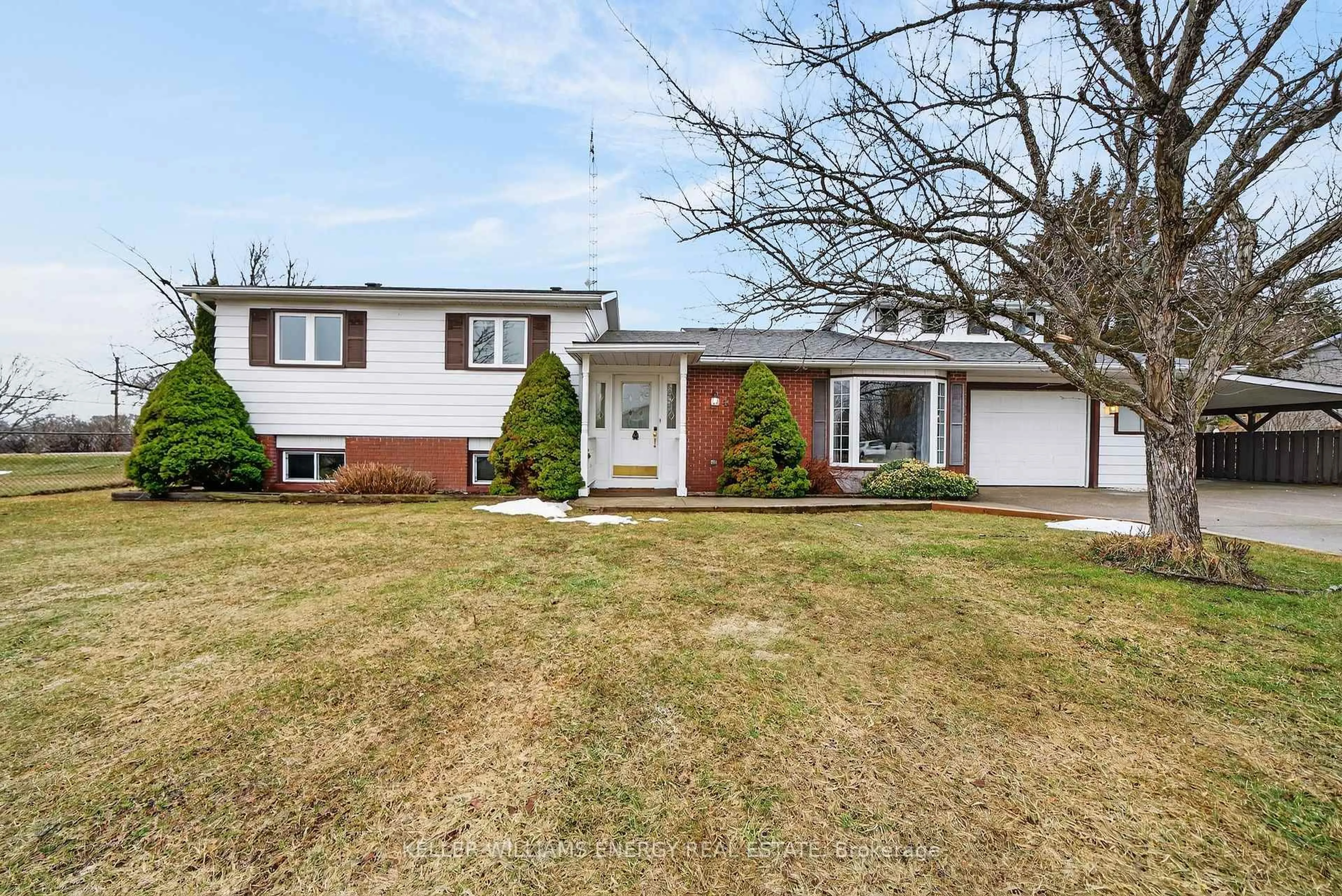 Home with vinyl exterior material, street for 4 Mary Ave, Prince Edward County Ontario K0K 3L0