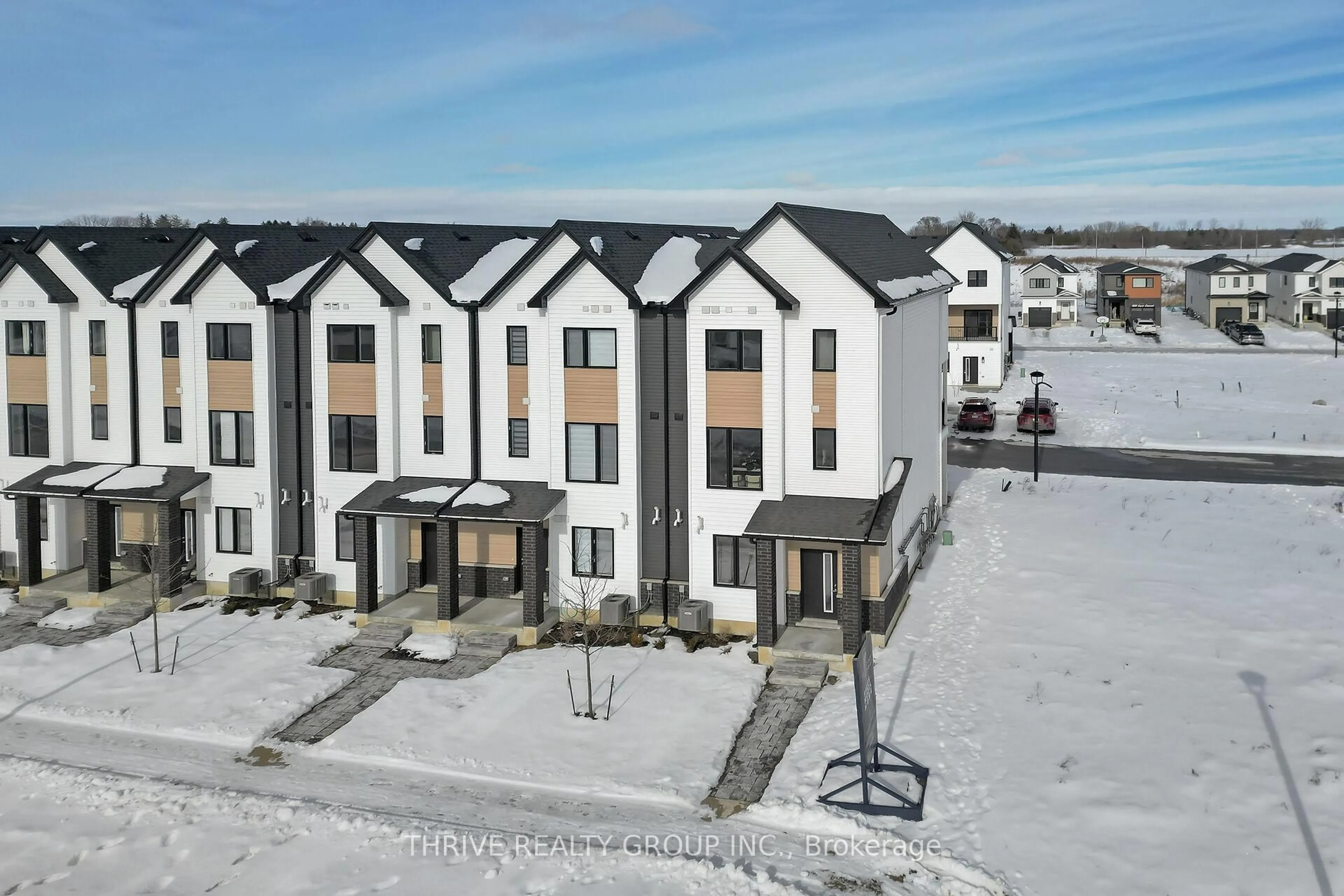 A pic from outside/outdoor area/front of a property/back of a property/a pic from drone, unknown for 1595 Capri Cres #66, London North Ontario N6G 3Y6