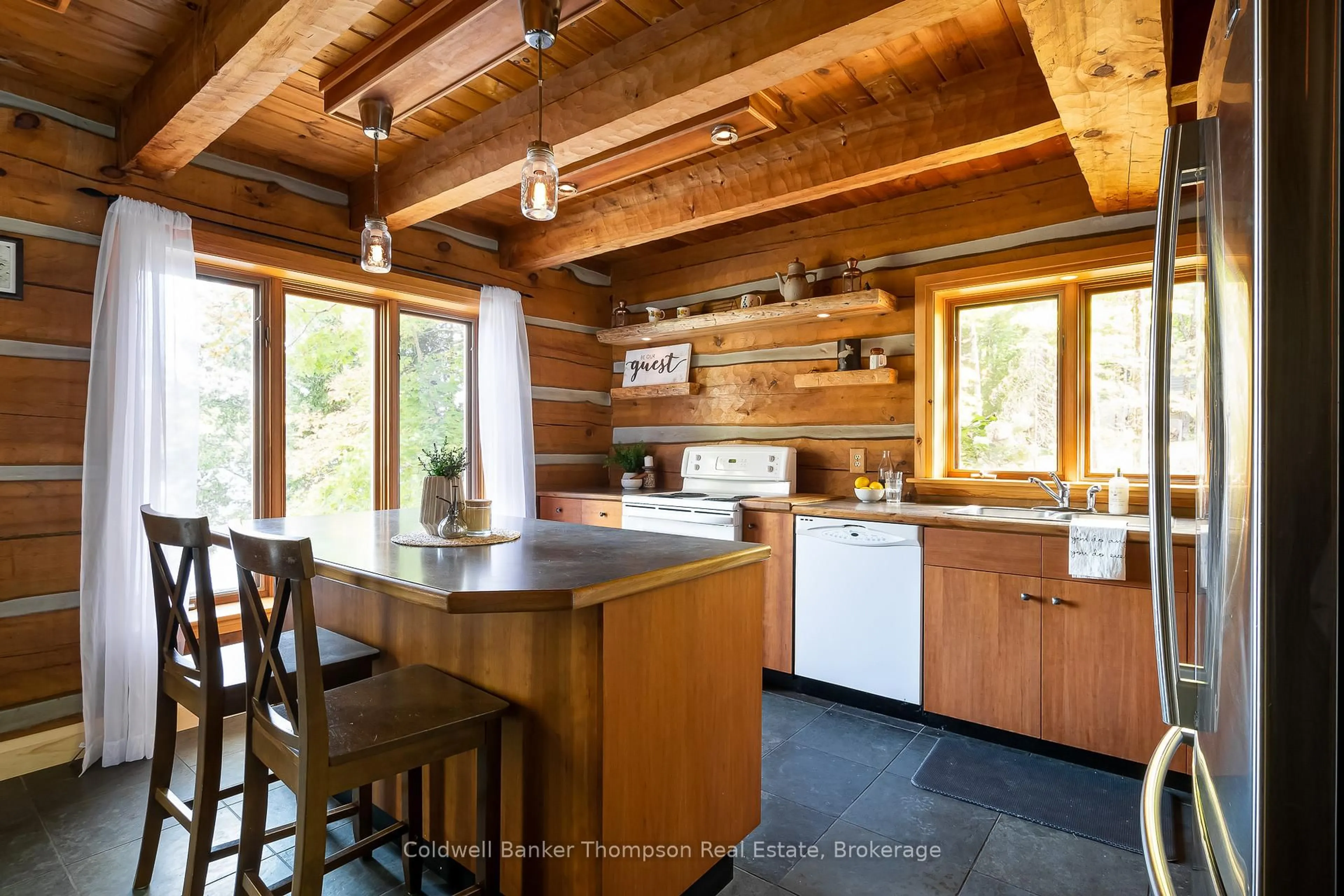 Rustic kitchen, wood/laminate floor for 18 Port Vernon Lane, Huntsville Ontario P1H 2J2