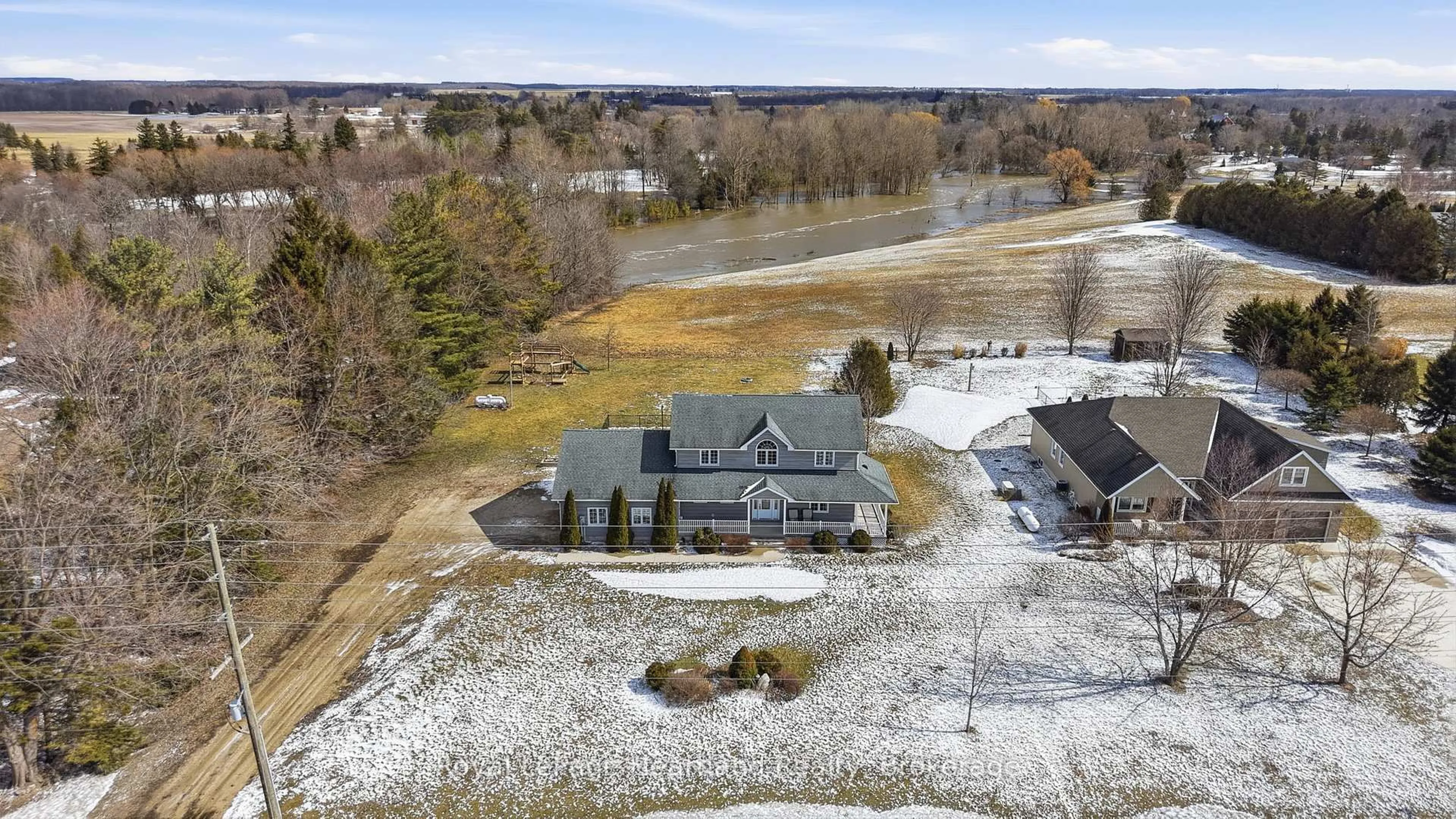 A pic from outside/outdoor area/front of a property/back of a property/a pic from drone, water/lake/river/ocean view for 1020 BRUSSELS Line, Howick Ontario N0G 2X0