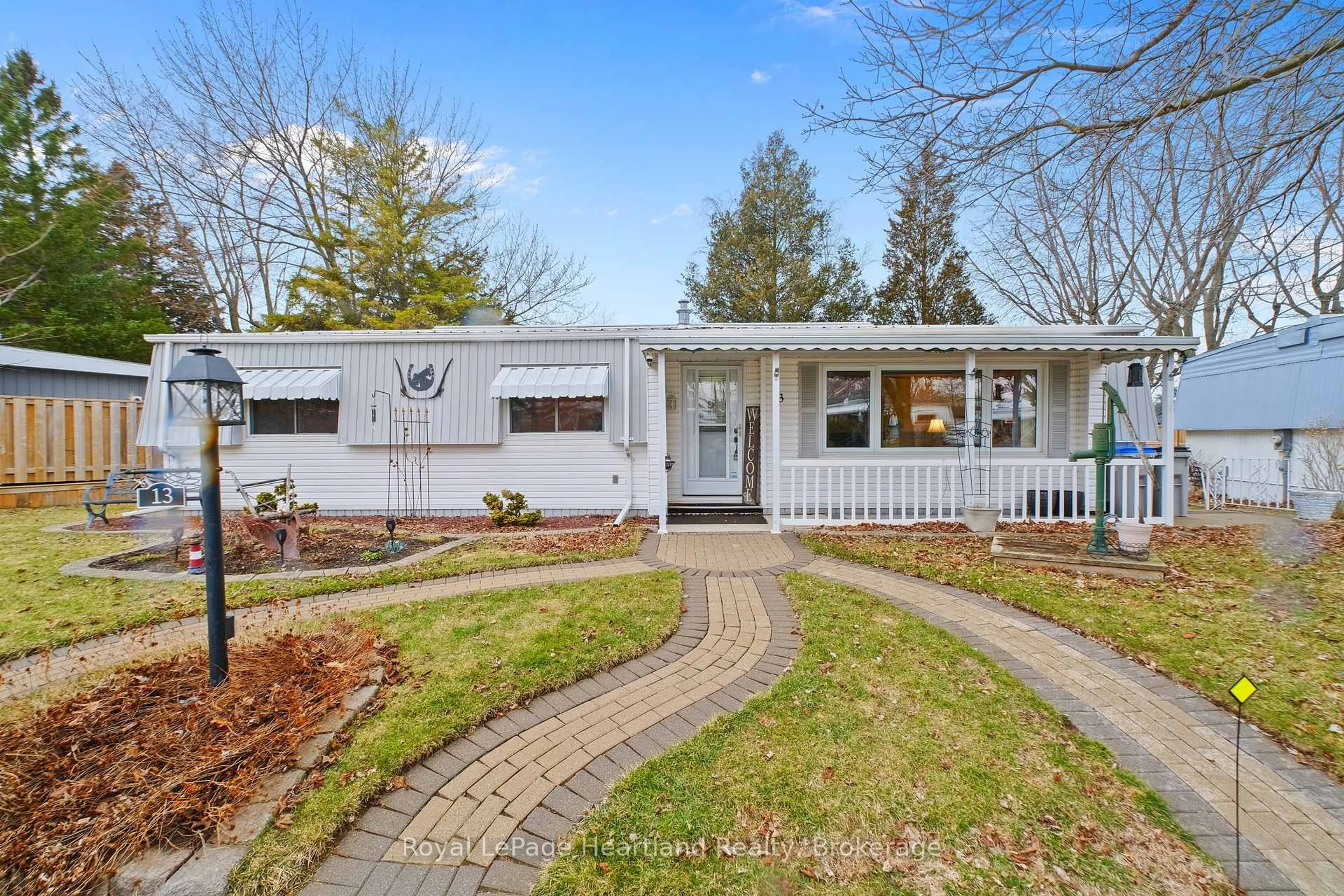 Home with vinyl exterior material, street for 13 Cypress Point Cres, South Huron Ontario N0M 1T0