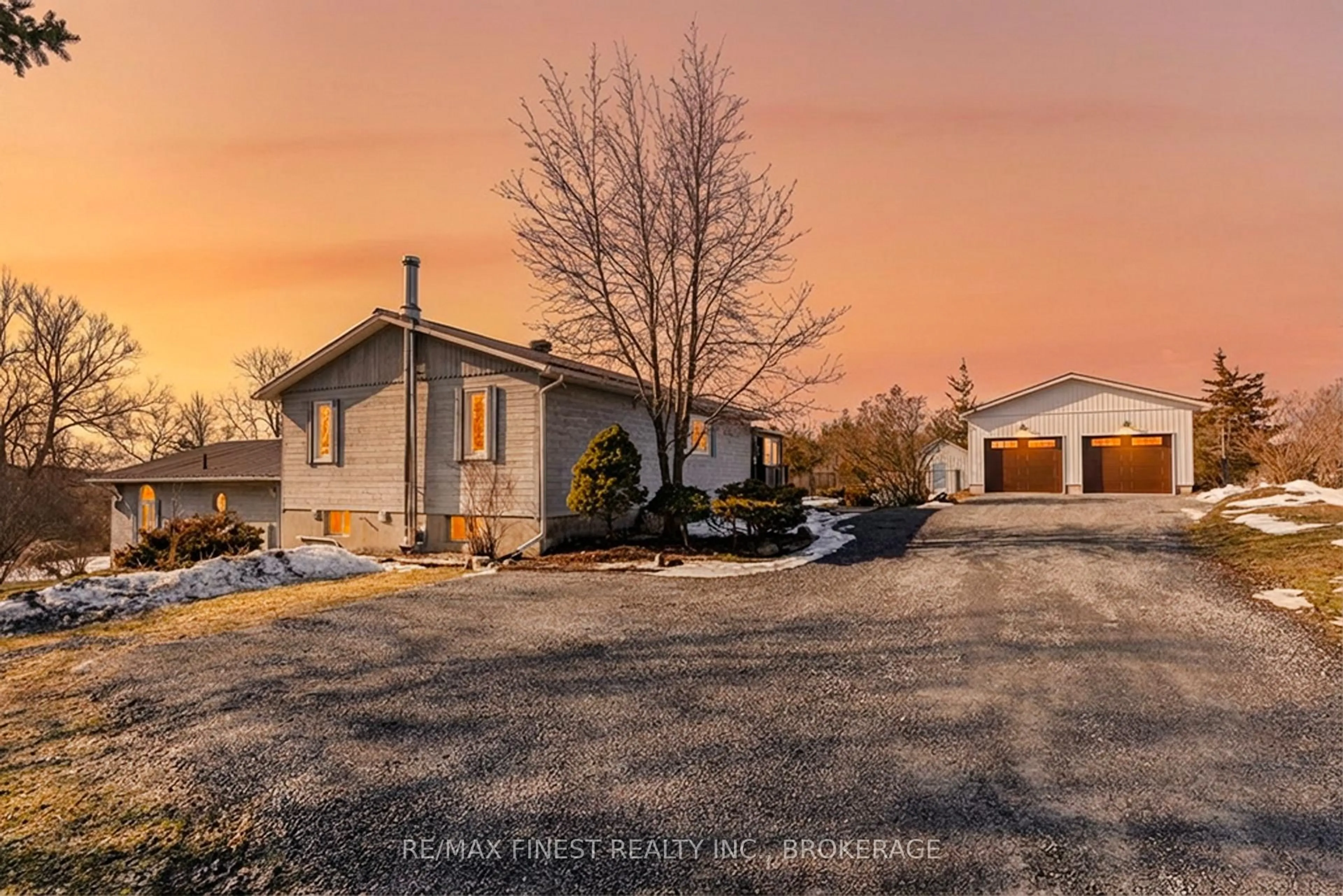 A pic from outside/outdoor area/front of a property/back of a property/a pic from drone, street for 704 Wing Rd, Bissett Creek Ontario K0H 2H0