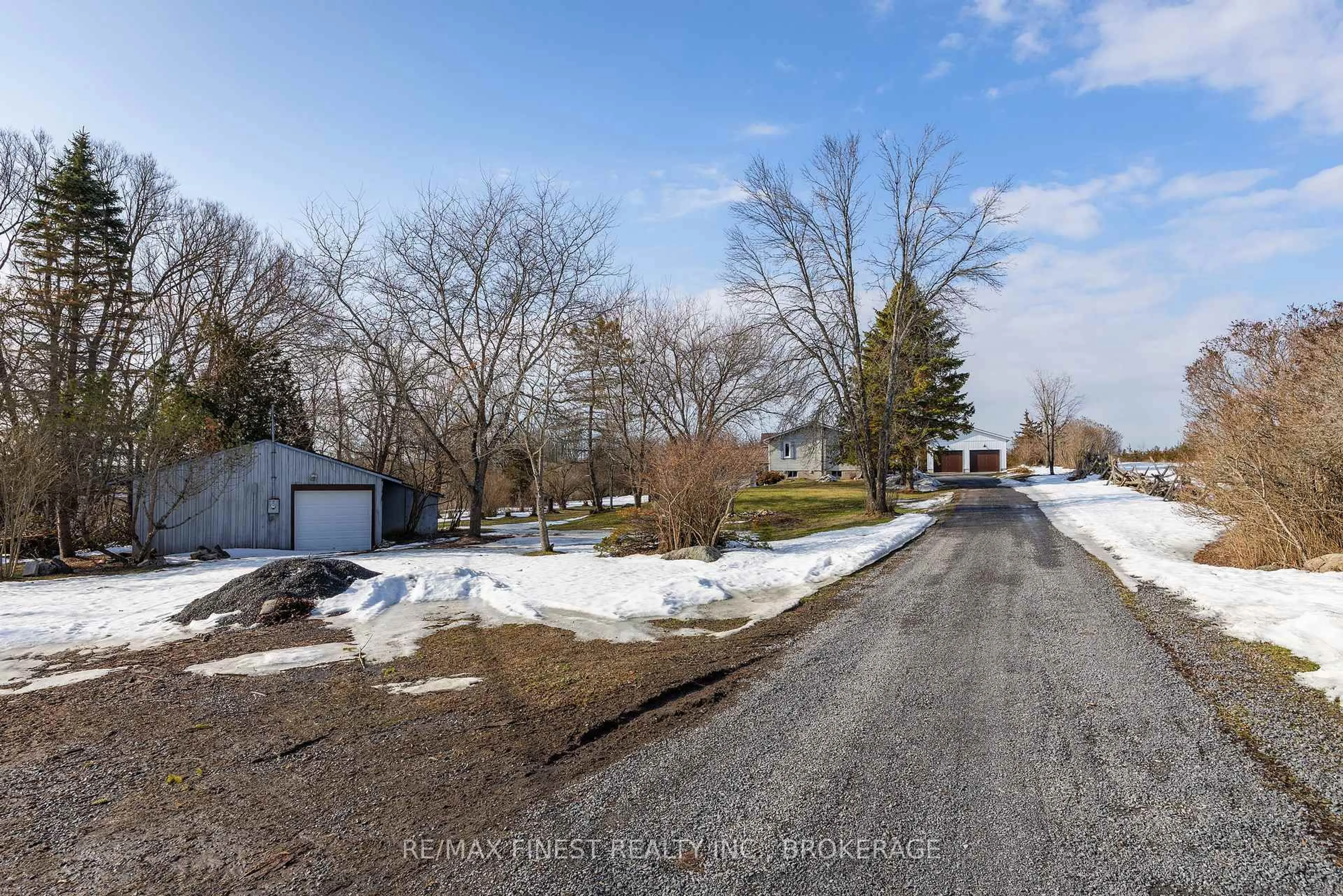 A pic from outside/outdoor area/front of a property/back of a property/a pic from drone, street for 704 Wing Rd, Bissett Creek Ontario K0H 2H0