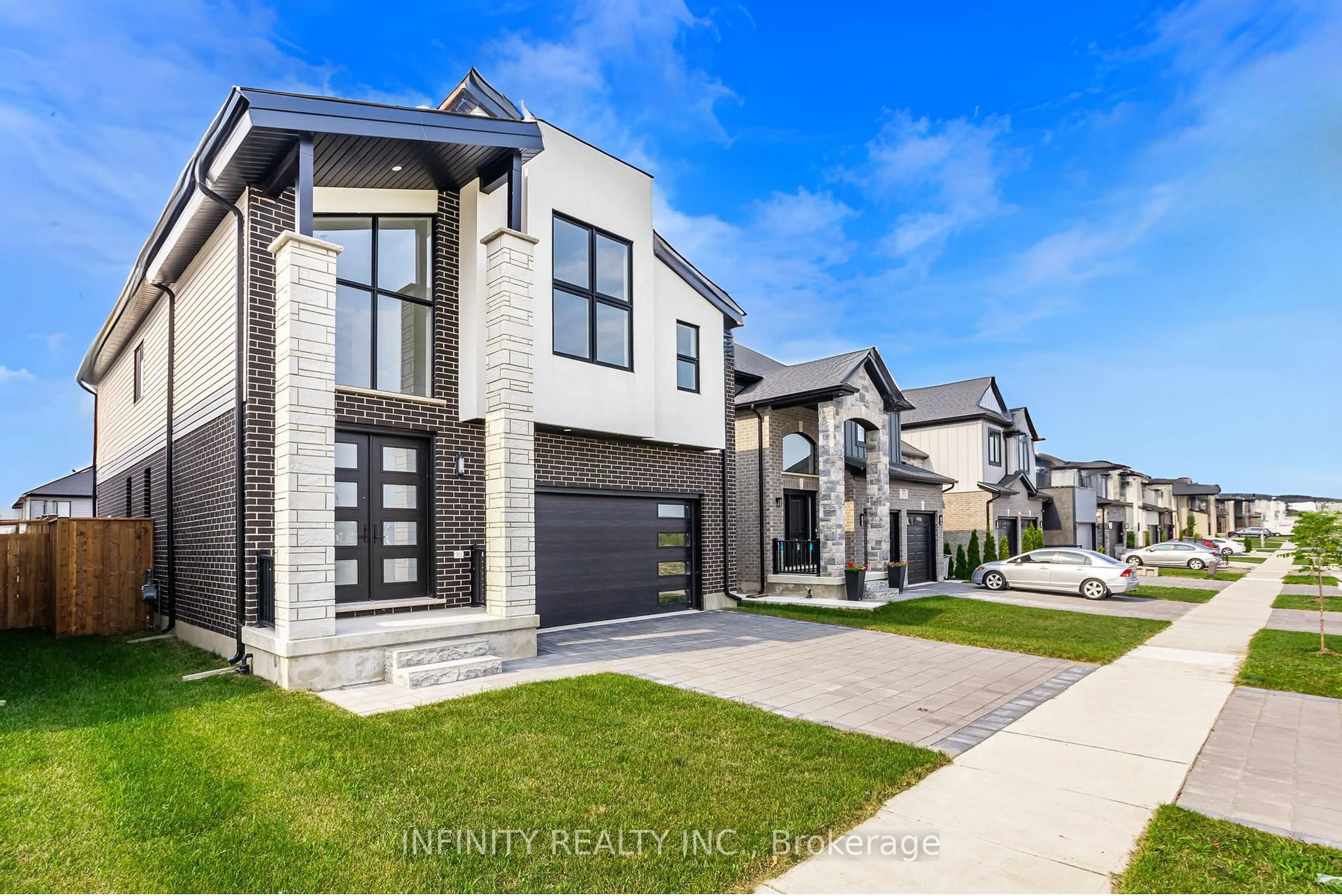 Home with brick exterior material, street for 157 Crestview Dr, Middlesex Centre Ontario N0L 1R0