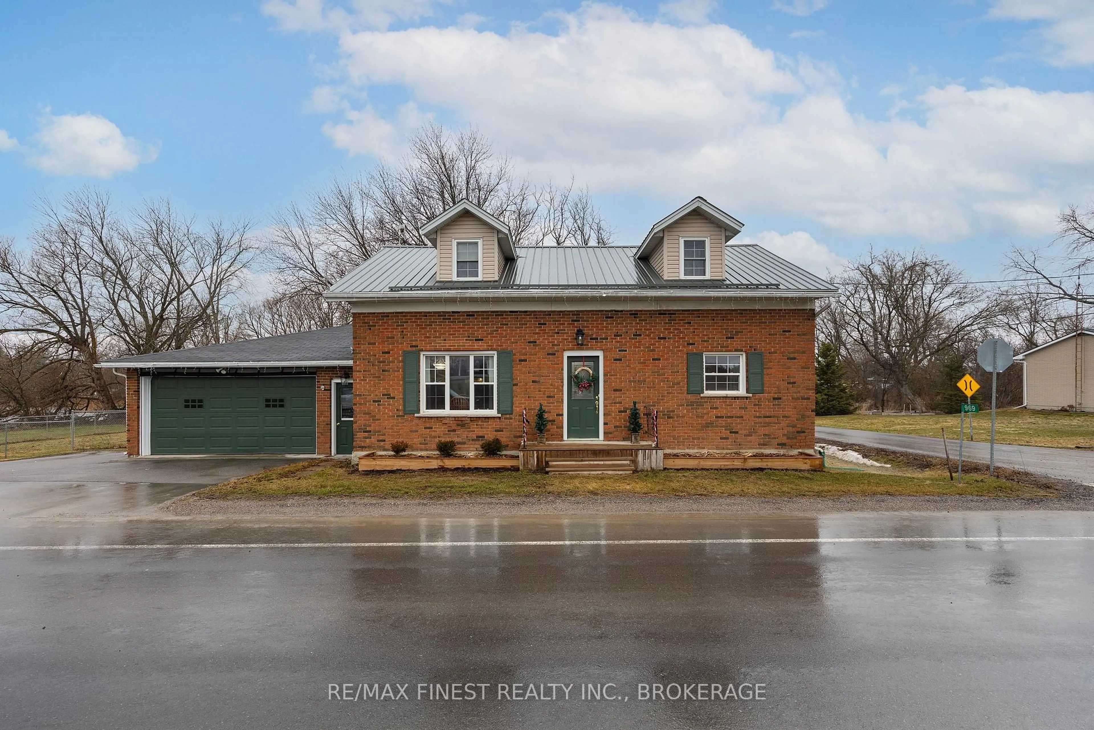 Home with brick exterior material, street for 969 Millhaven Rd, Bissett Creek Ontario K0H 2H0