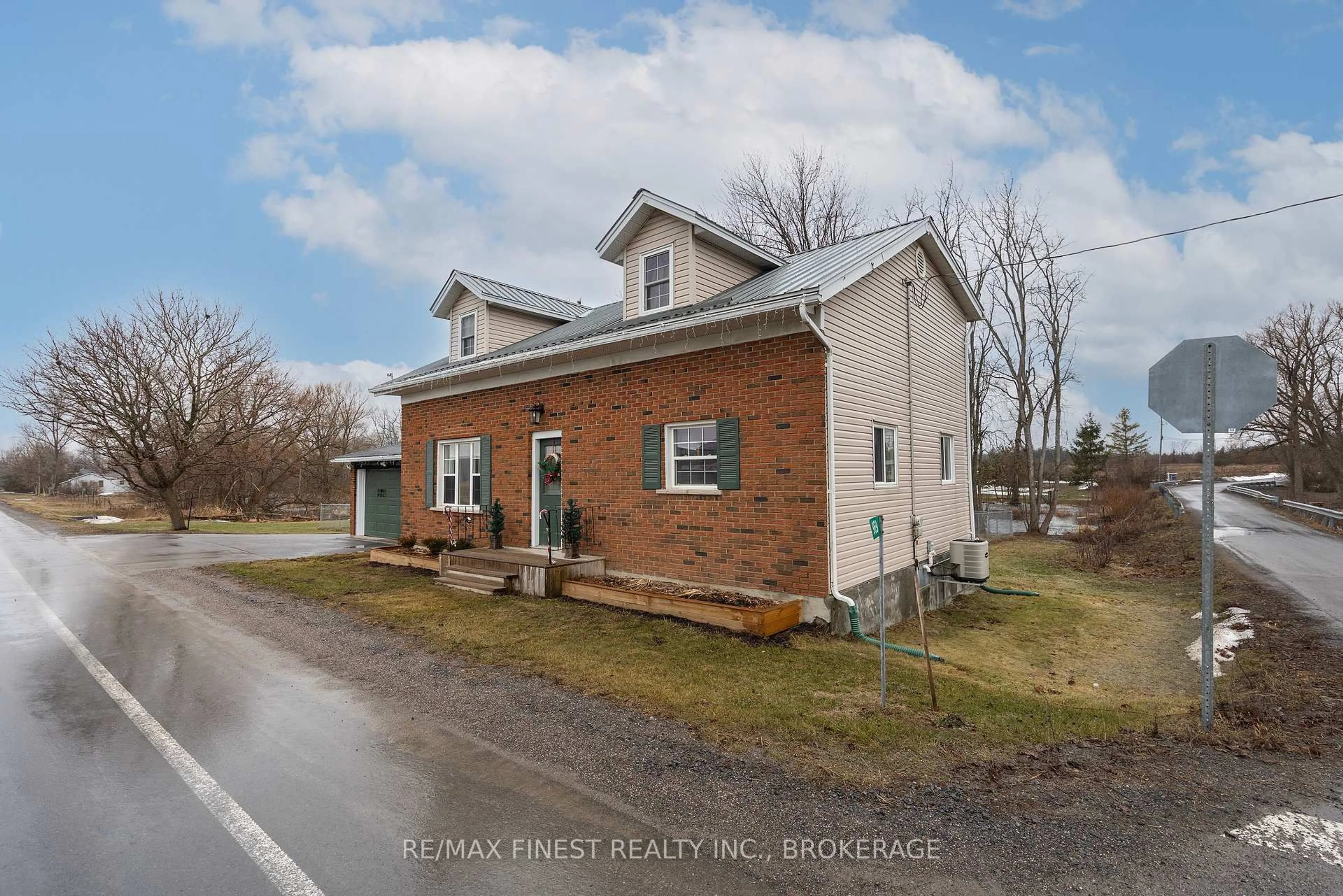 A pic from outside/outdoor area/front of a property/back of a property/a pic from drone, street for 969 Millhaven Rd, Bissett Creek Ontario K0H 2H0