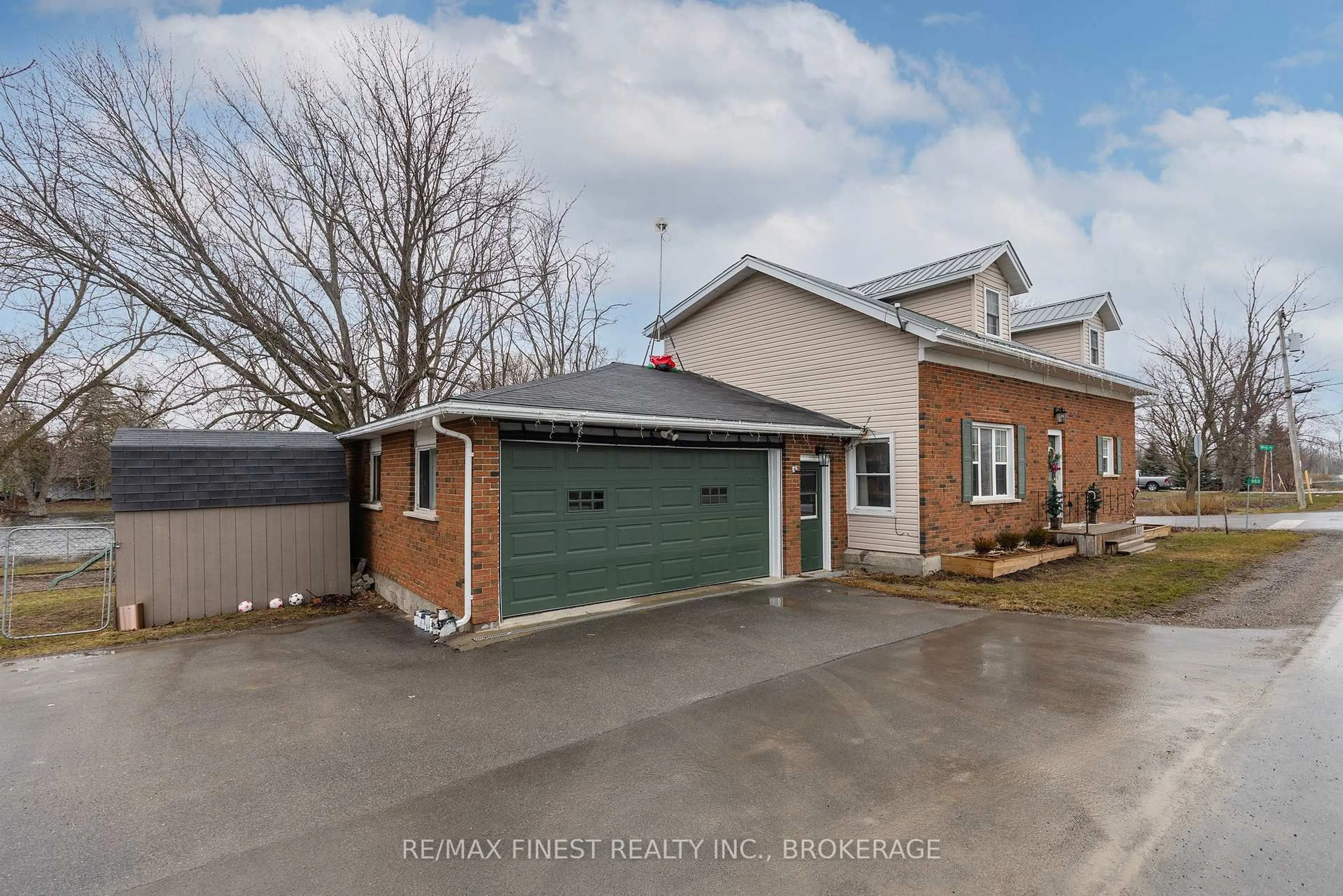 A pic from outside/outdoor area/front of a property/back of a property/a pic from drone, street for 969 Millhaven Rd, Bissett Creek Ontario K0H 2H0