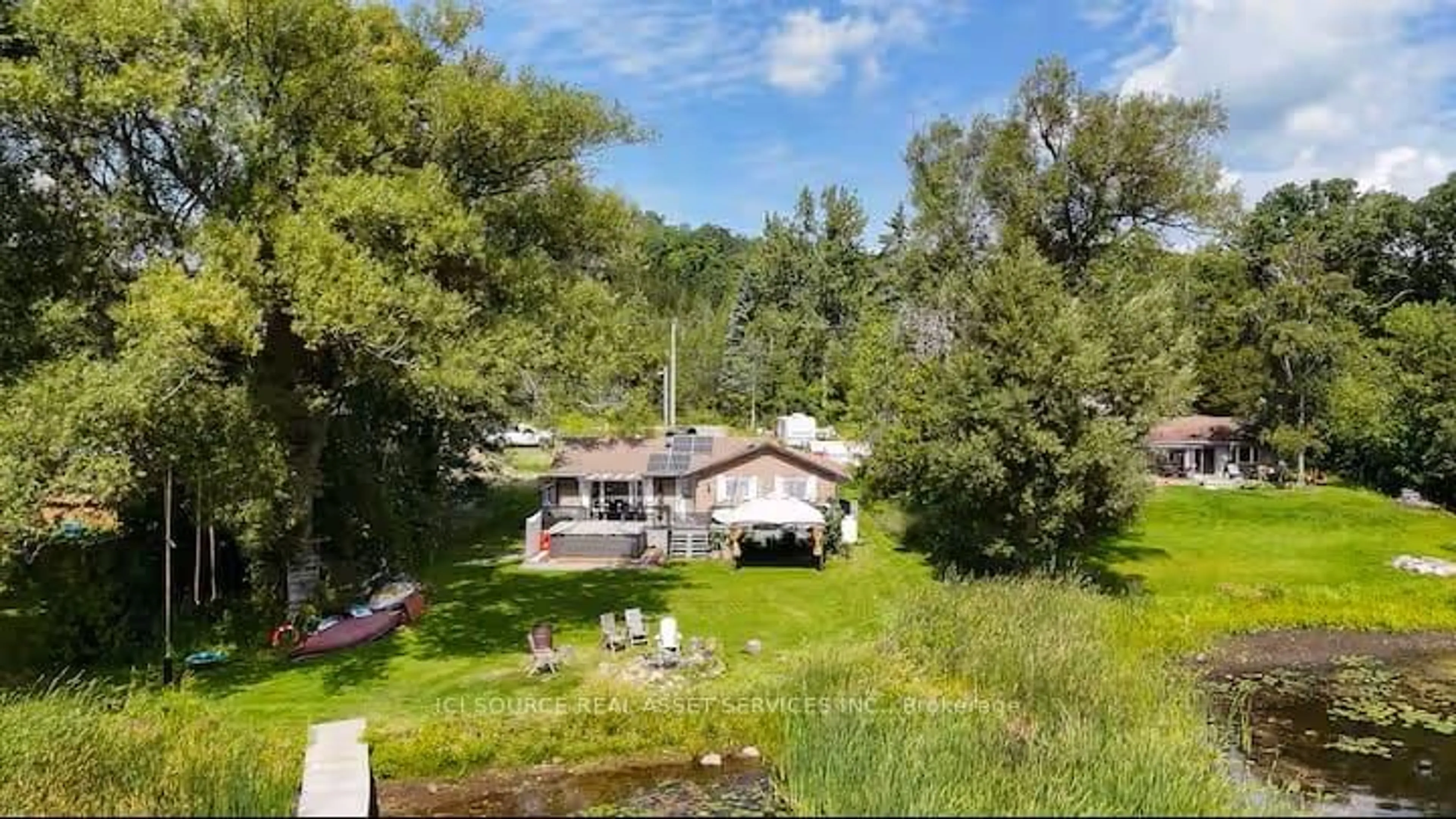 A pic from outside/outdoor area/front of a property/back of a property/a pic from drone, water/lake/river/ocean view for 106 Canal Lane, Hastings Ontario K0K 2C0