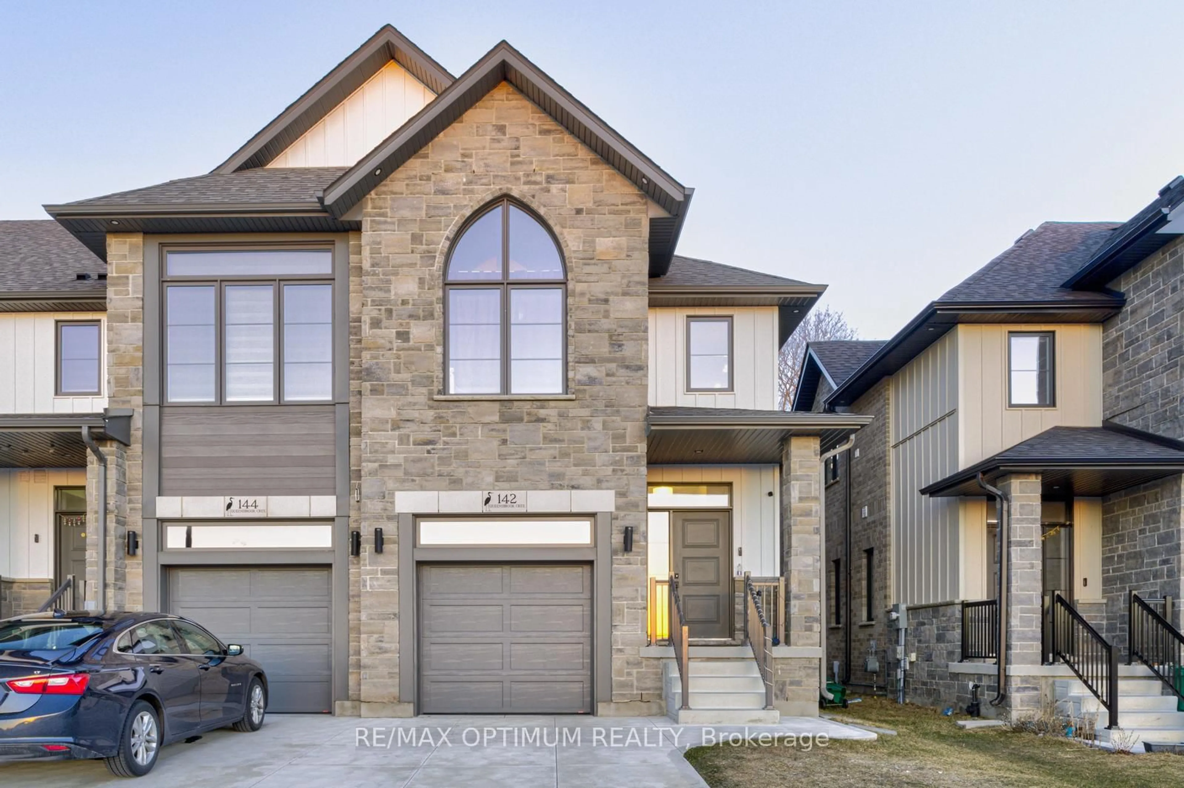 Home with brick exterior material, street for 142 Queensbrook Cres, Cambridge Ontario N1S 0E4