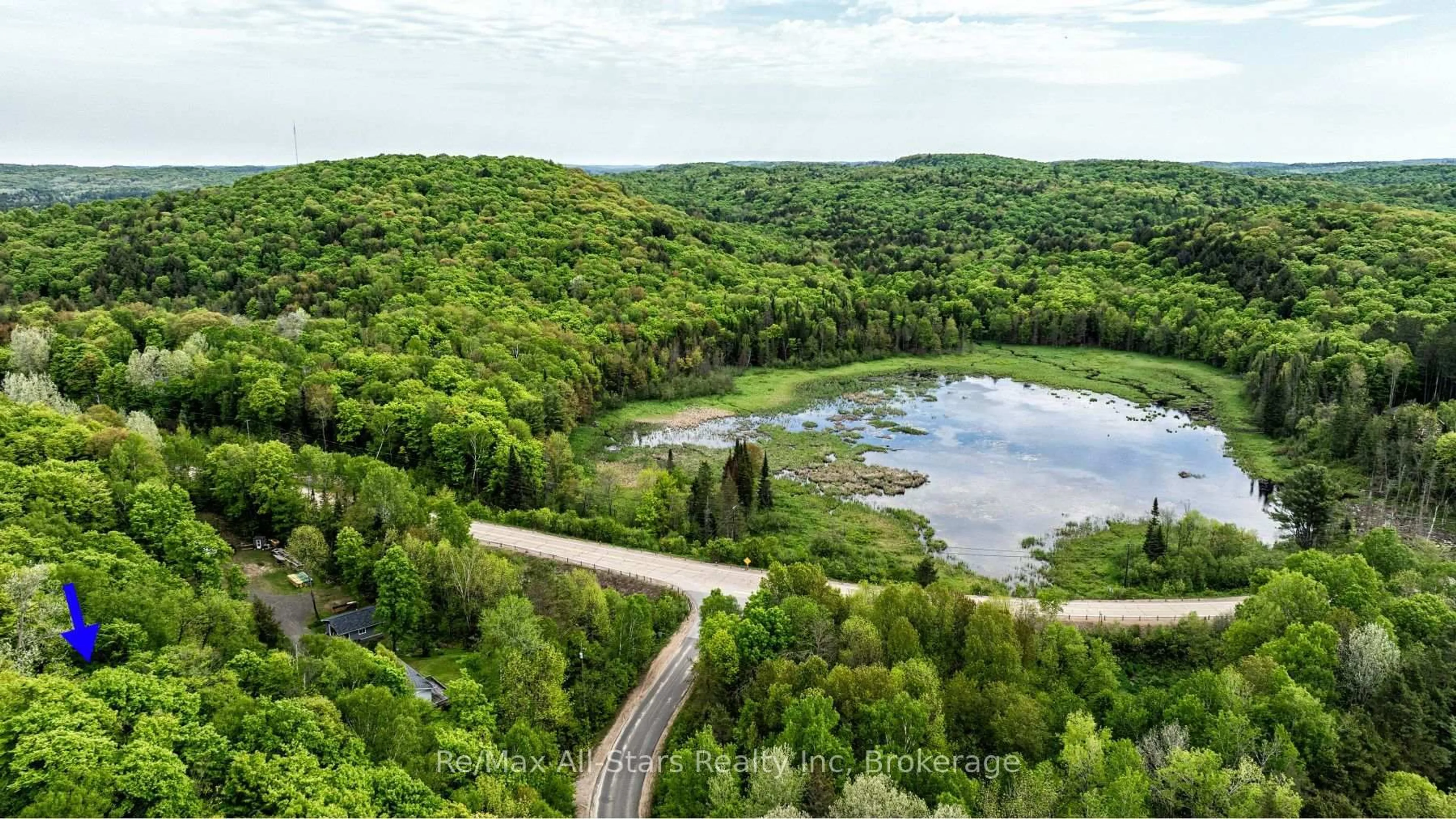 A pic from outside/outdoor area/front of a property/back of a property/a pic from drone, water/lake/river/ocean view for 1028 Ronville Rd, Lake of Bays Ontario P0A 1H0