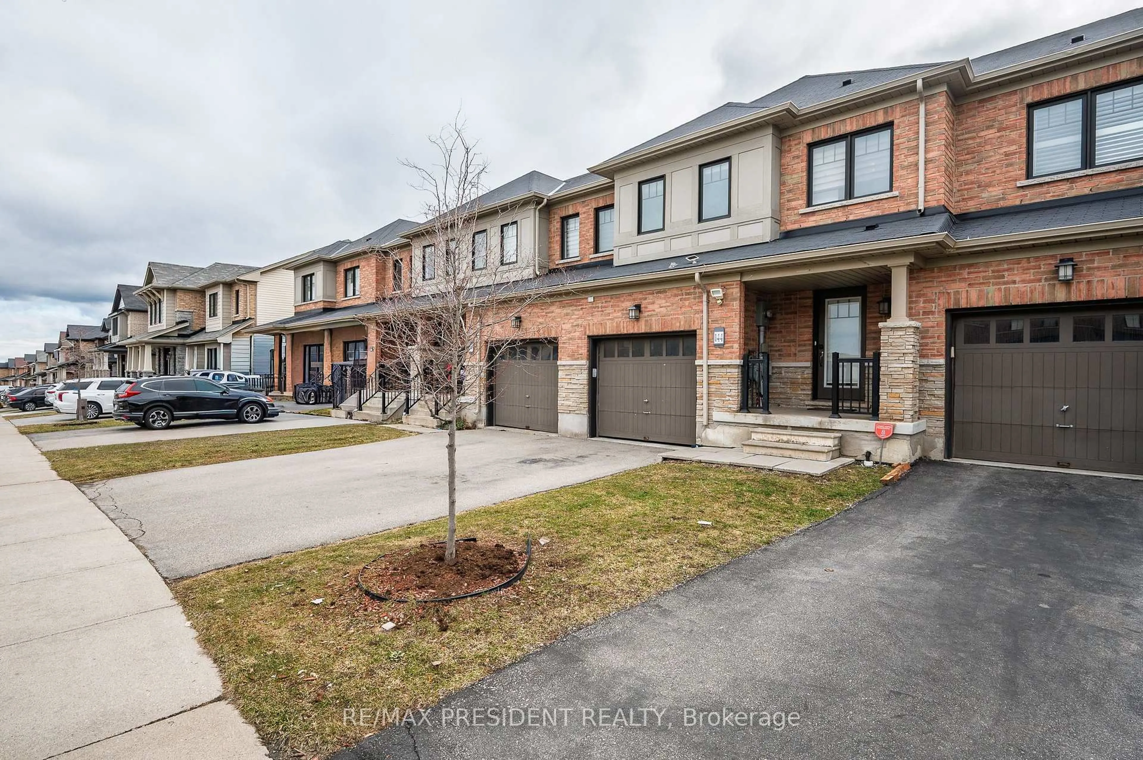 Home with brick exterior material, street for 144 Crafter Cres, Hamilton Ontario L8J 0H8