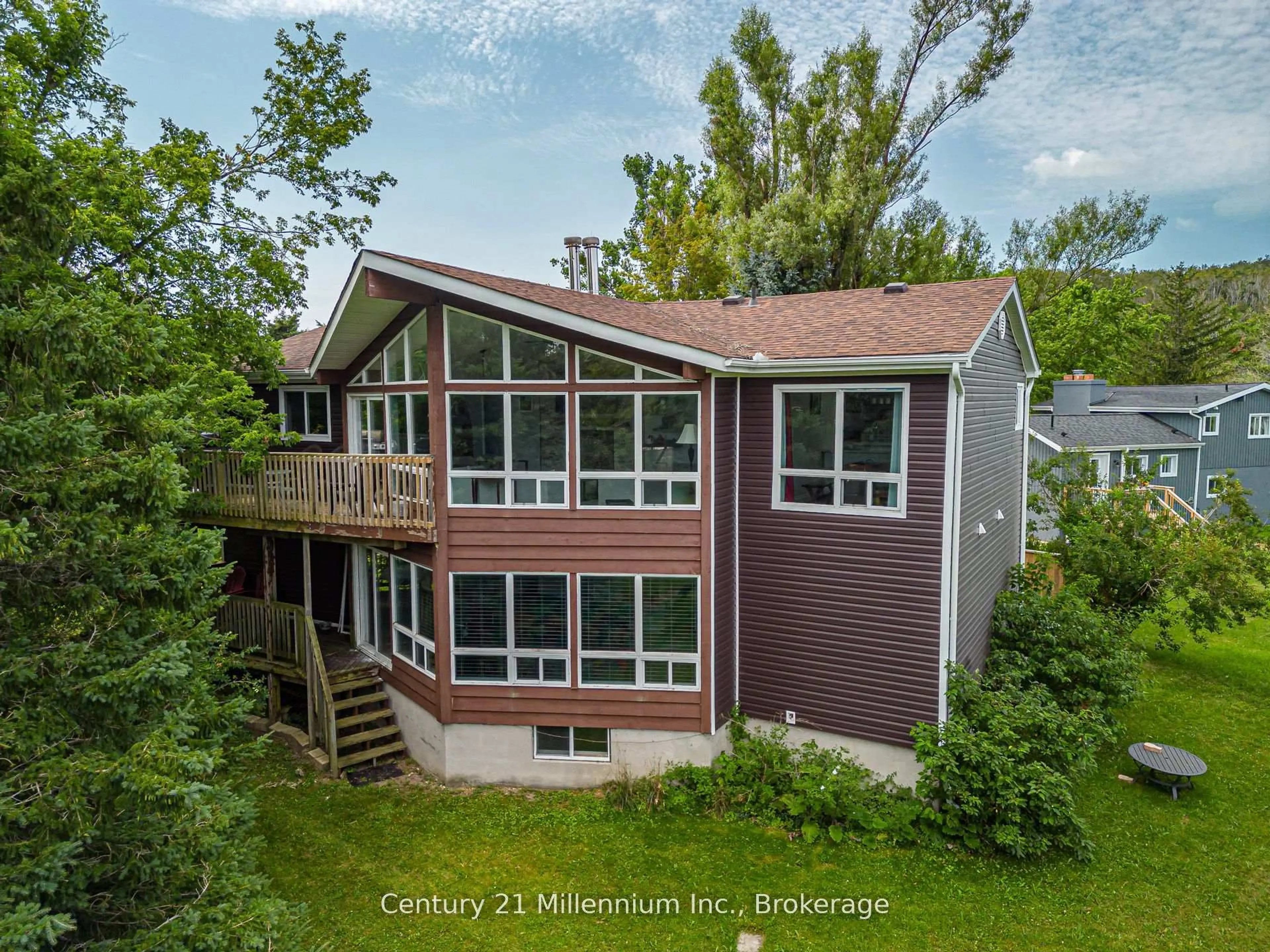A pic from outside/outdoor area/front of a property/back of a property/a pic from drone, water/lake/river/ocean view for 127 Scandia Lane, Blue Mountains Ontario N0H 2E0