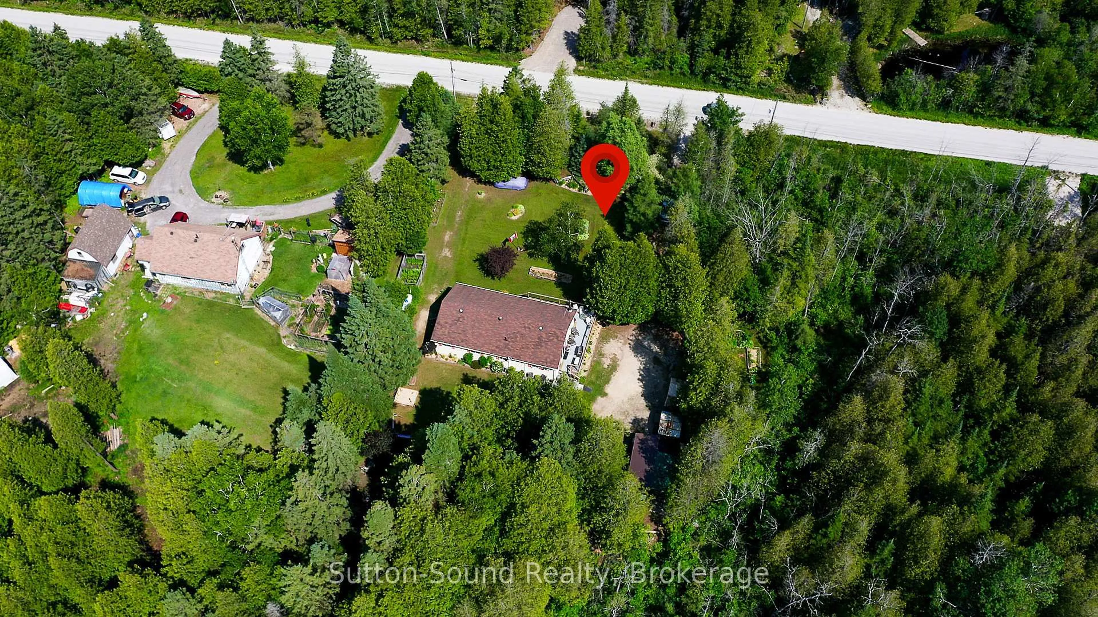 A pic from outside/outdoor area/front of a property/back of a property/a pic from drone, forest/trees view for 27 Whiskey Harbour Rd, Northern Bruce Peninsula Ontario N0H 1X0