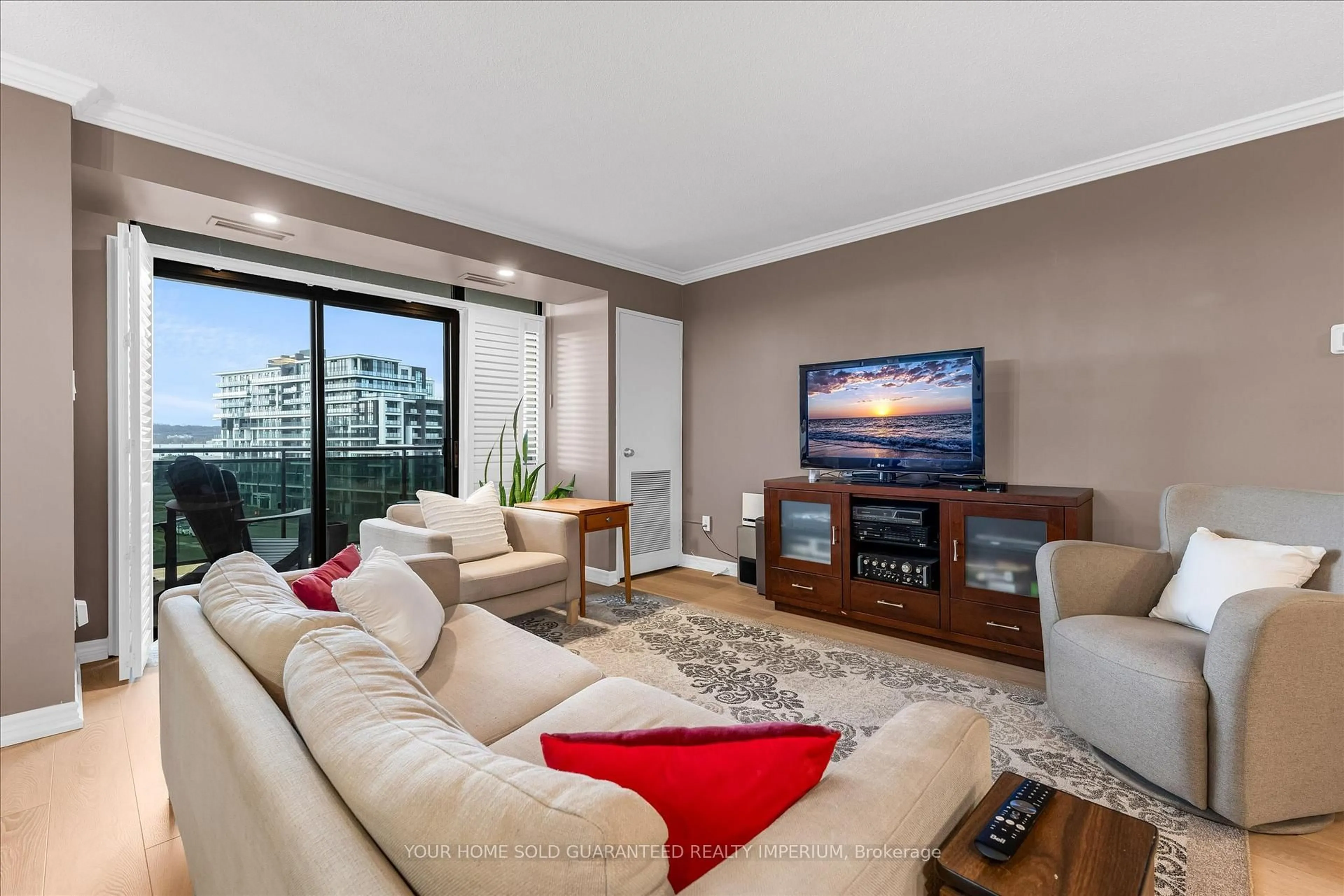 Living room with furniture, unknown for 301 Frances Ave #705, Hamilton Ontario L8E 3M6