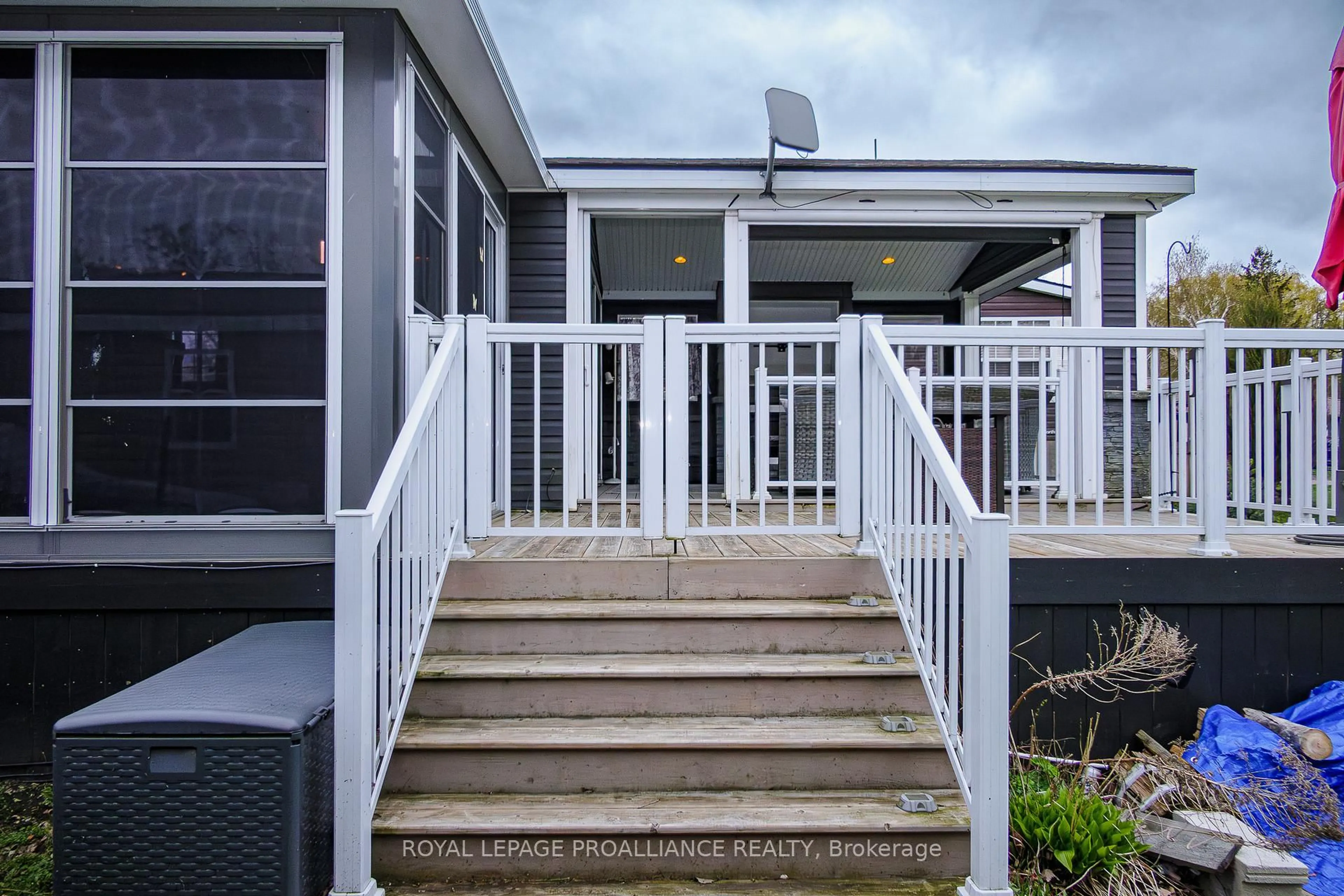 Home with vinyl exterior material, building for 486 County Road 18 #3 Cherry Beach Lane, Prince Edward County Ontario K0K 1P0