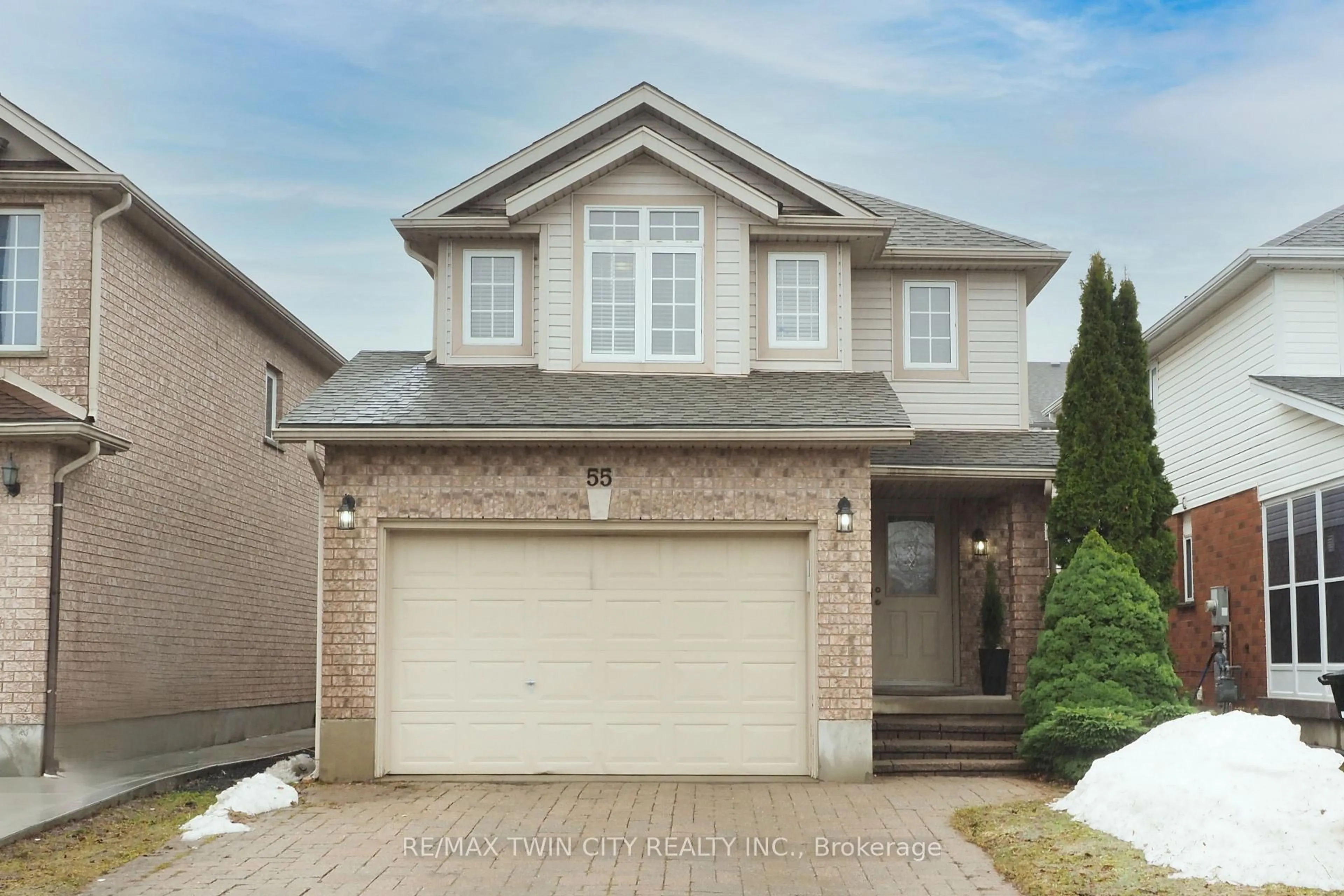 Home with vinyl exterior material, street for 55 Bridlewreath St, Kitchener Ontario N2E 3V5