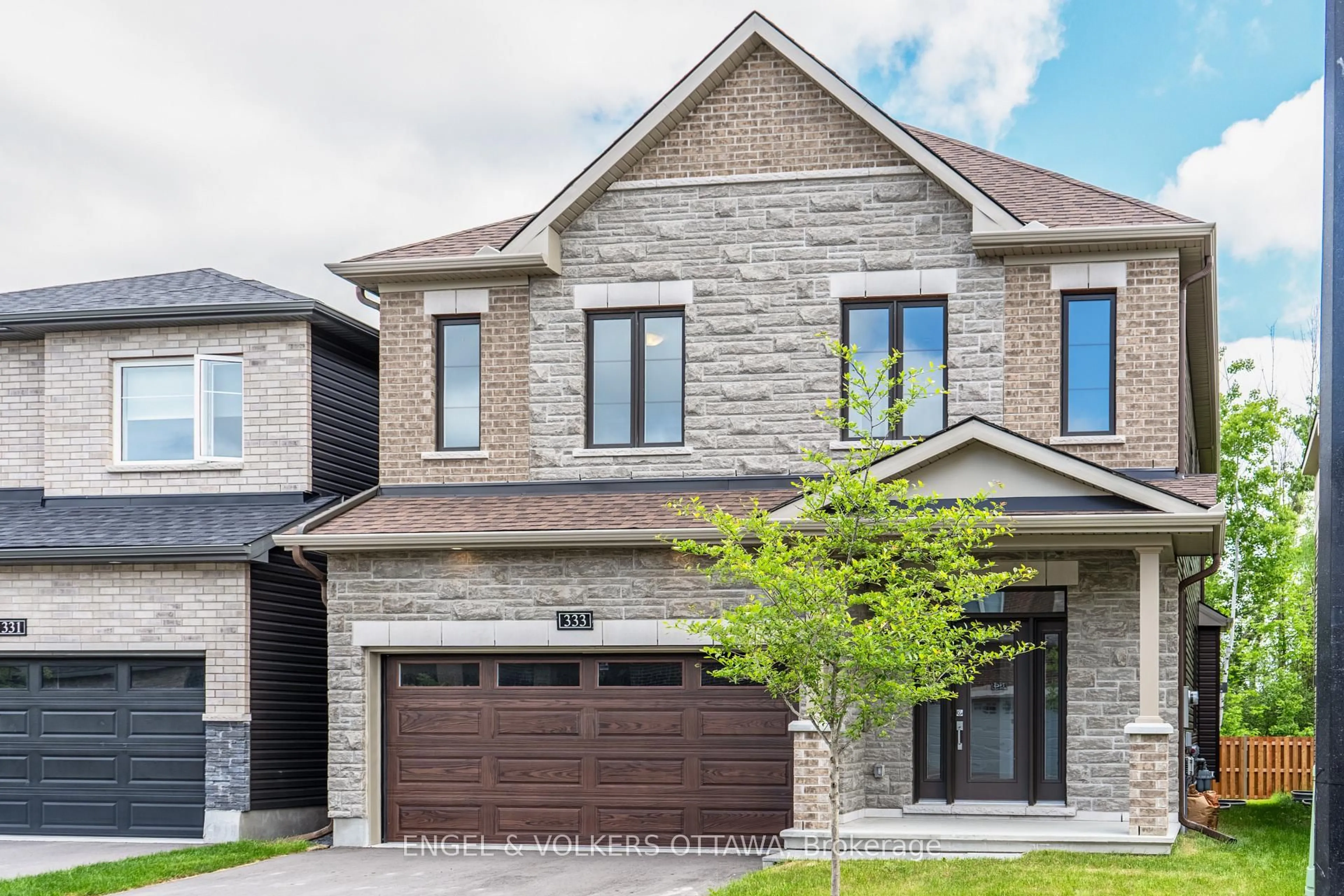 Home with brick exterior material, street for 333 Elsie Macgill Walk, Kanata Ontario K2W 0K7