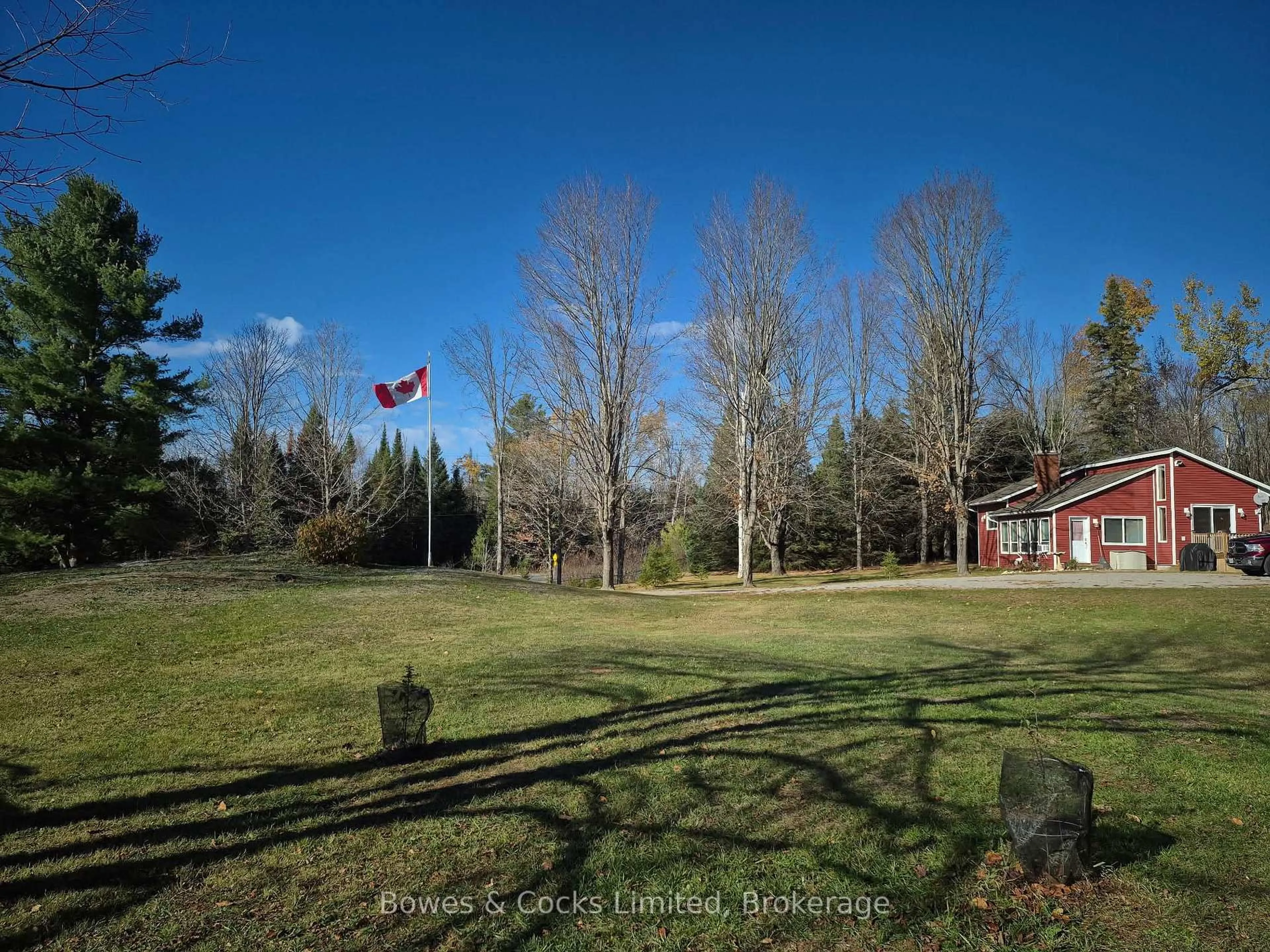 A pic from outside/outdoor area/front of a property/back of a property/a pic from drone, forest/trees view for 1165 County Road 620, North Kawartha Ontario K0L 1A0
