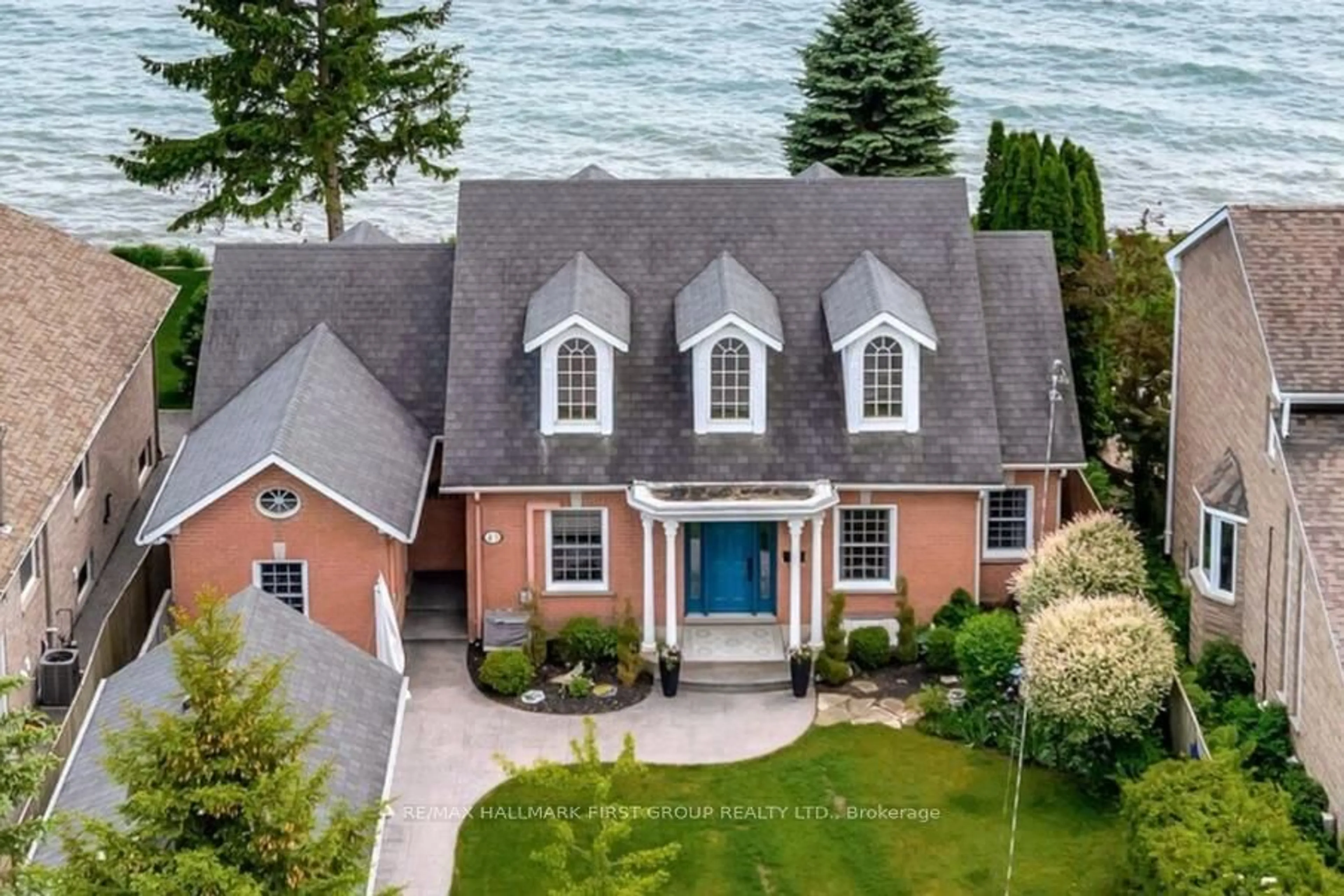 A pic from outside/outdoor area/front of a property/back of a property/a pic from drone, water/lake/river/ocean view for 43 Tremaine Terr, Cobourg Ontario K9A 5A7