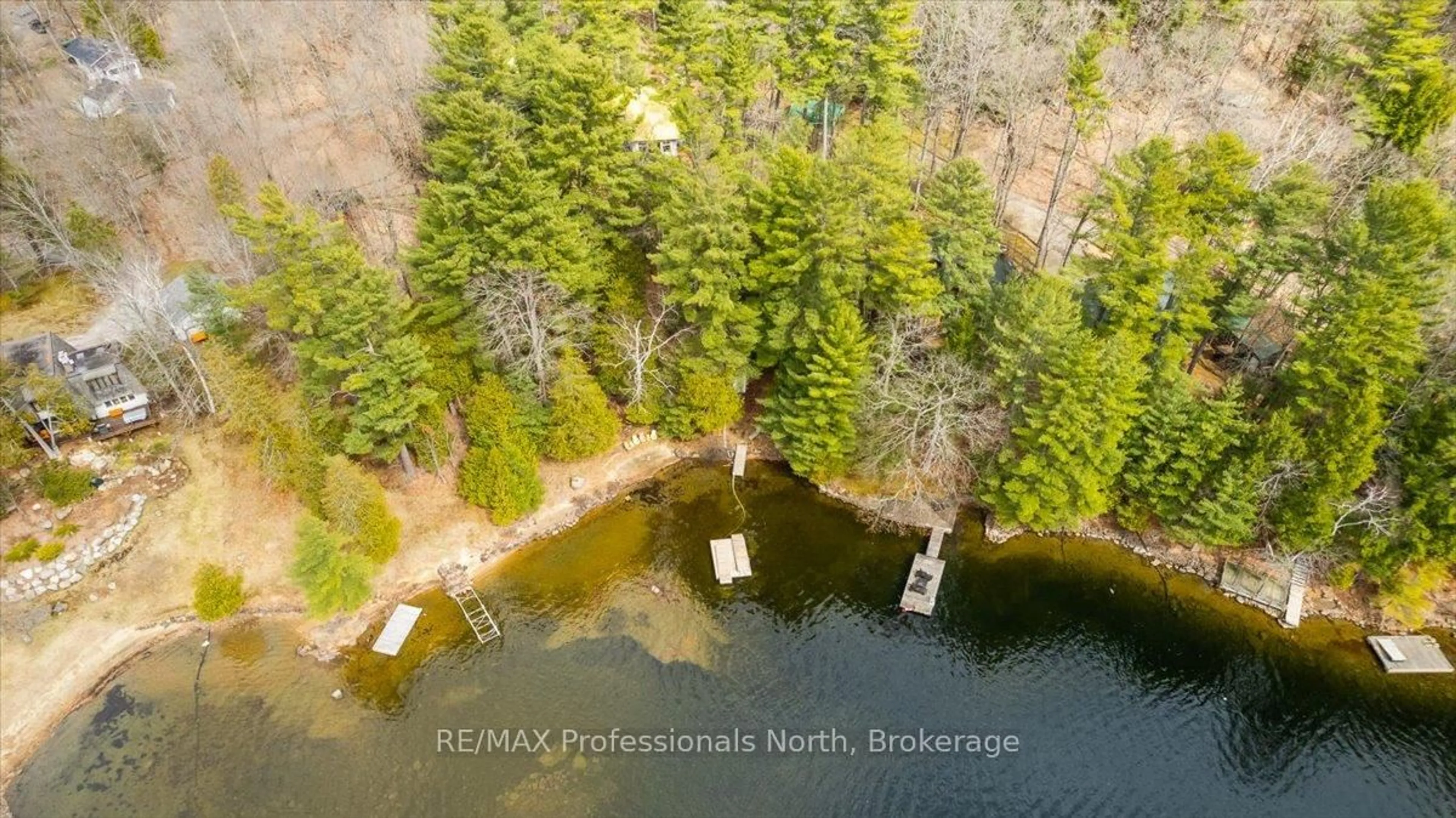 A pic from outside/outdoor area/front of a property/back of a property/a pic from drone, water/lake/river/ocean view for 1032 PARALLEL FALLS Lane, Minden Hills Ontario K0M 2K0