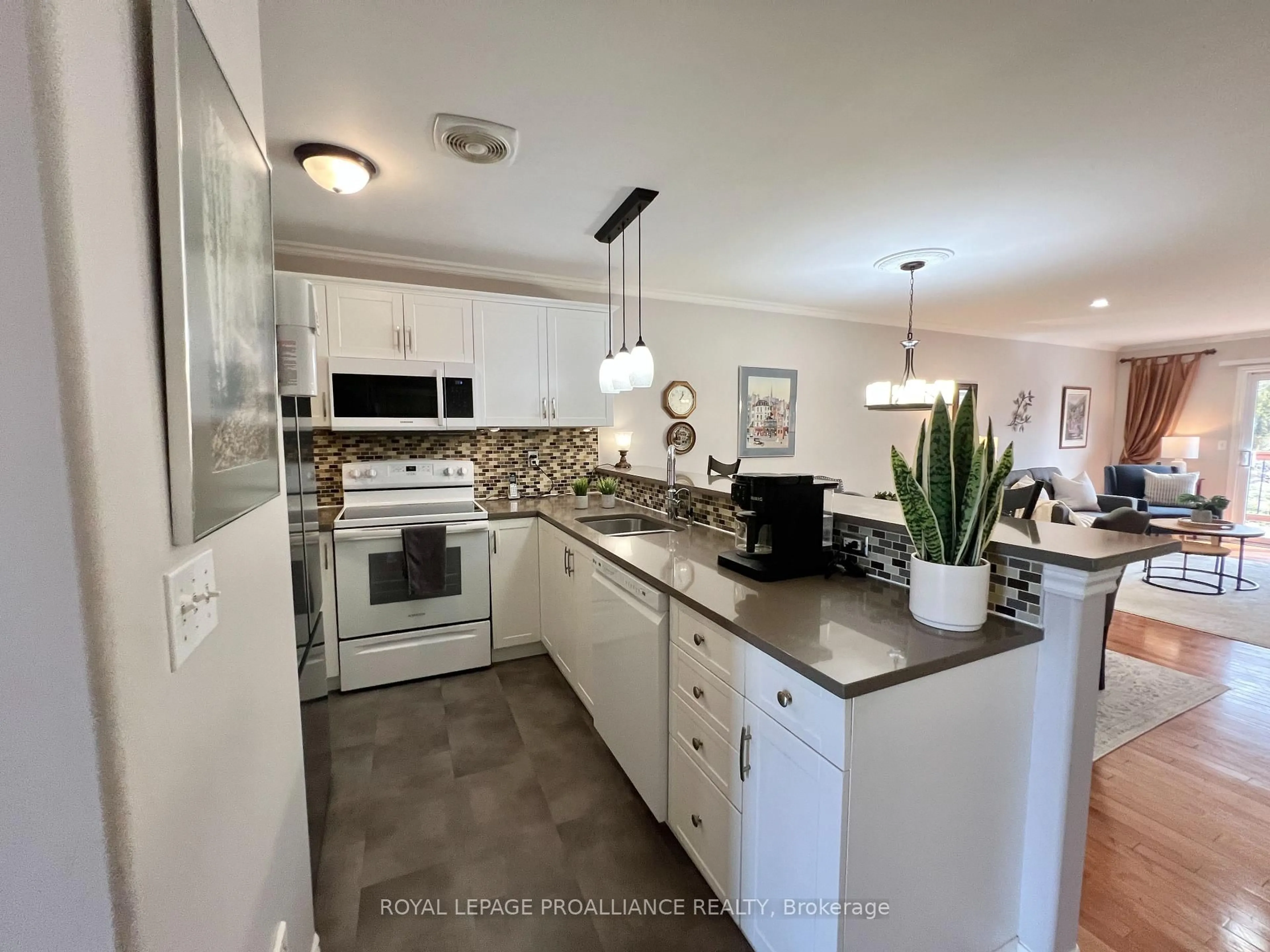 Open concept kitchen, ceramic/tile floor for 35 Albion St #13, Belleville Ontario K8N 5Y8