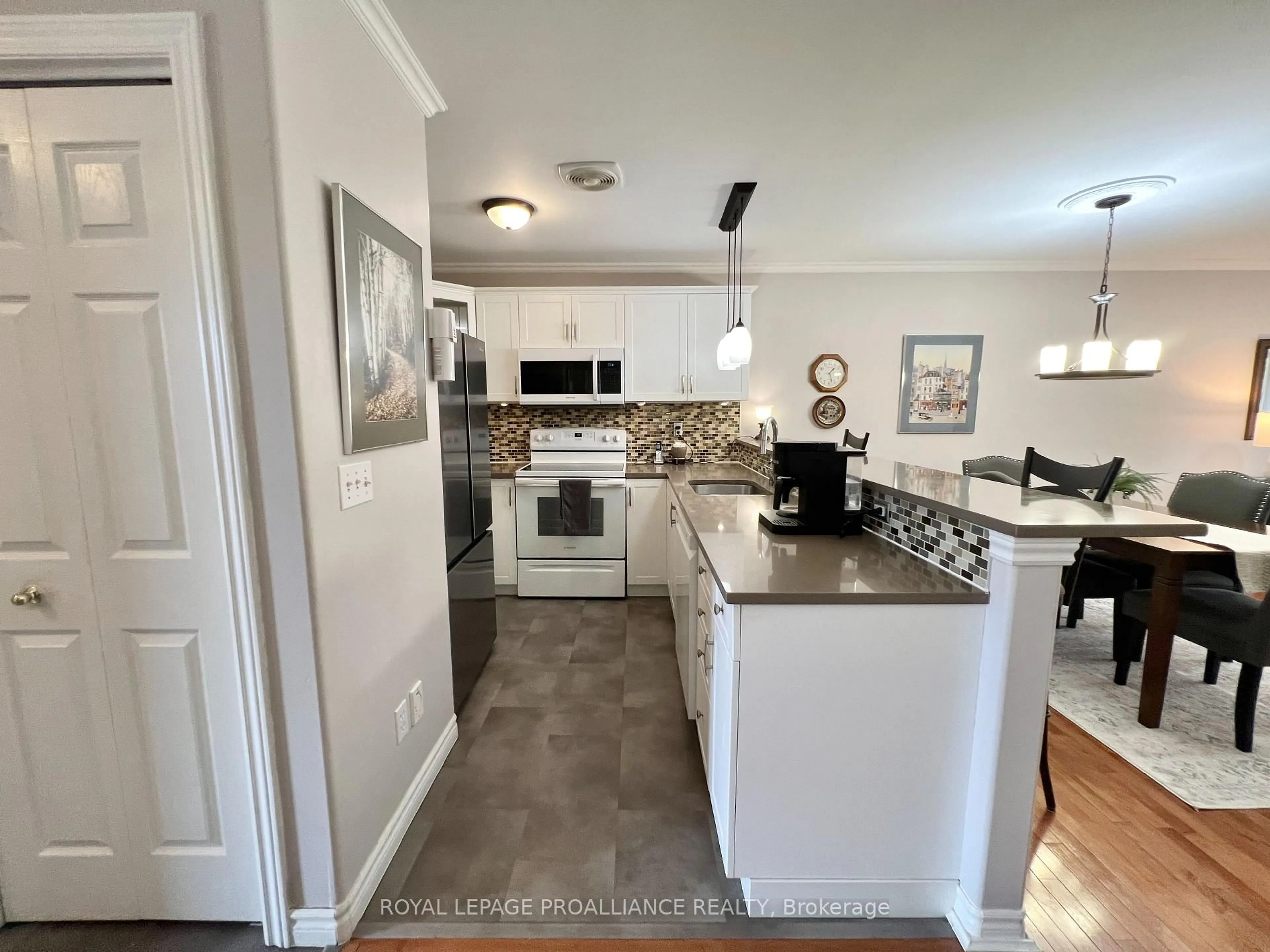 Open concept kitchen, ceramic/tile floor for 35 Albion St #13, Belleville Ontario K8N 5Y8