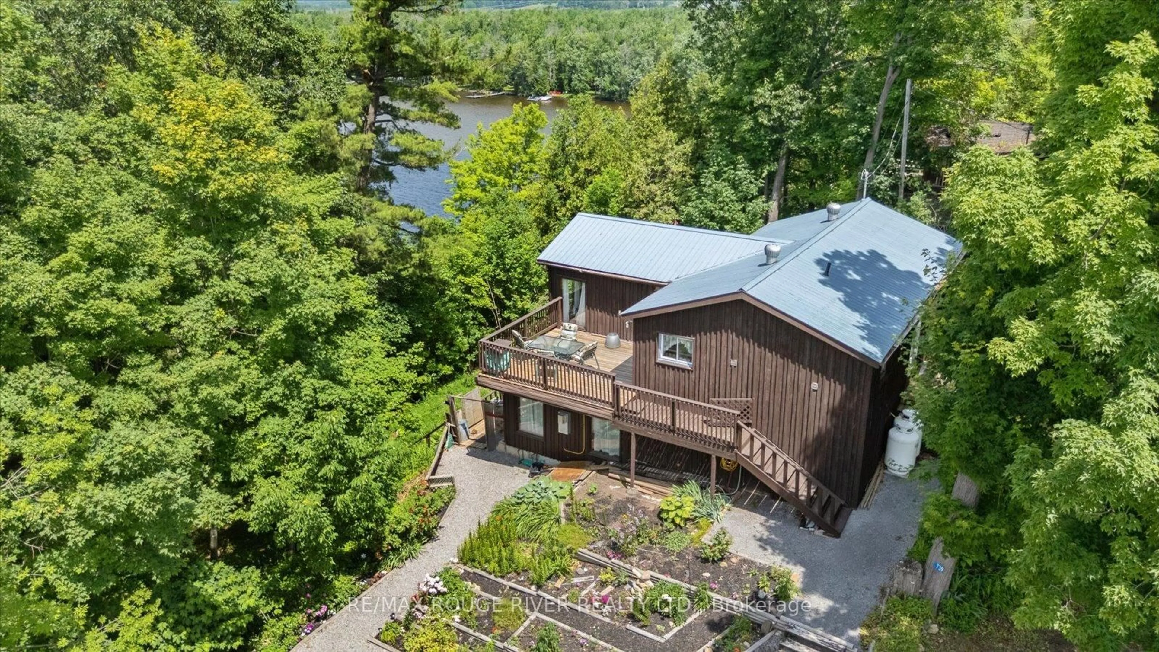 A pic from outside/outdoor area/front of a property/back of a property/a pic from drone, water/lake/river/ocean view for 739 Marble Point Rd, Limoges Ontario K0K 2M0