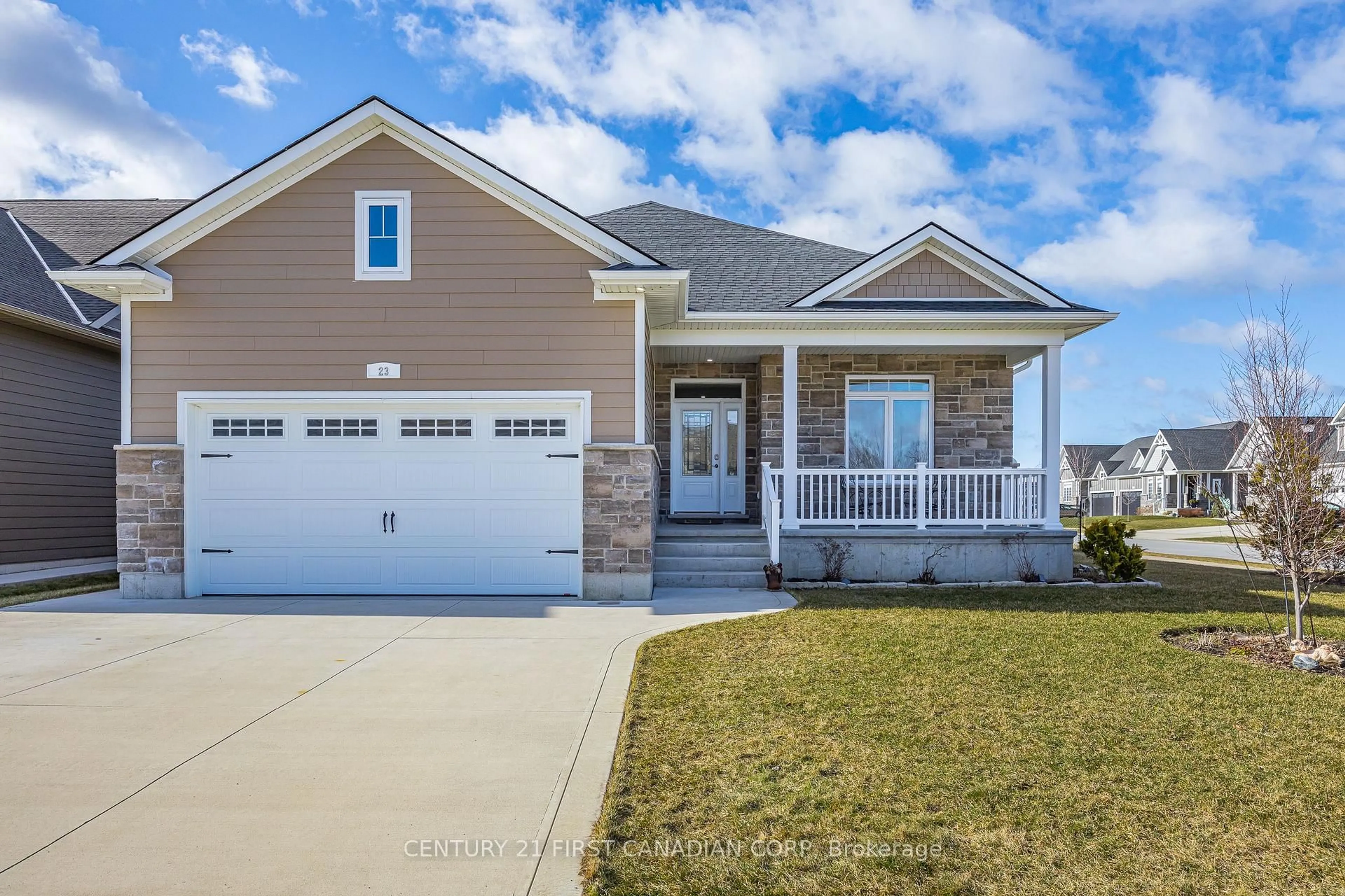 Home with vinyl exterior material, street for 23 Brooklawn Dr, Lambton Shores Ontario N0M 1T0