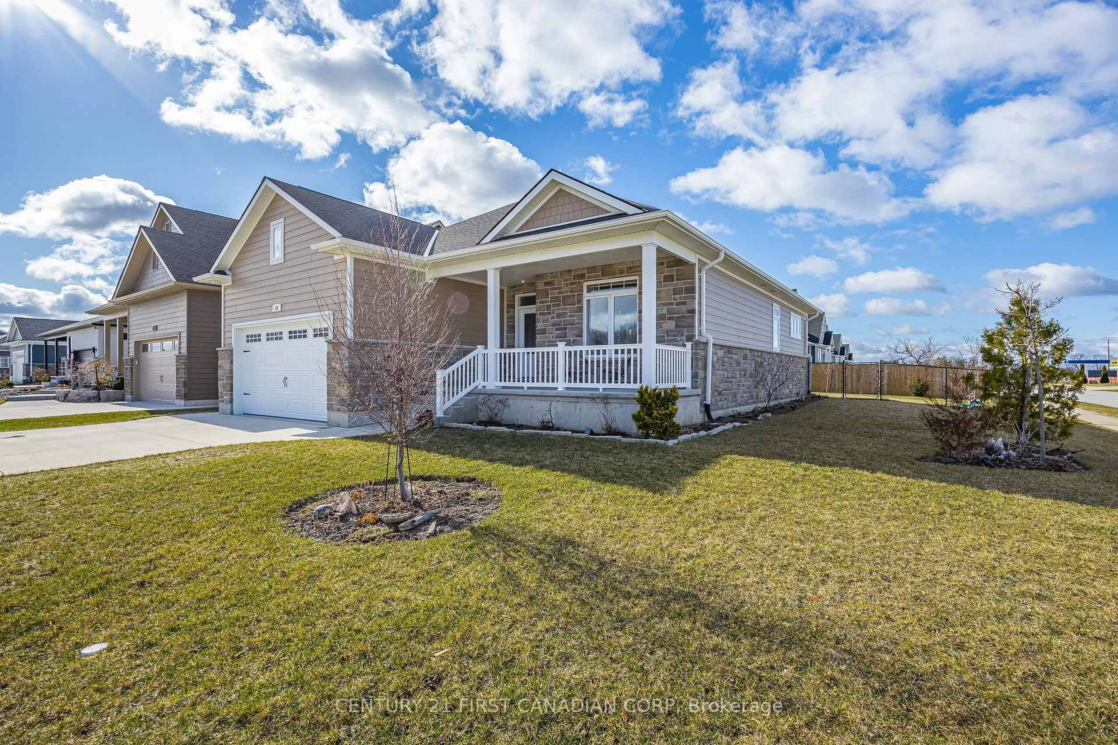 Home with brick exterior material, street for 23 Brooklawn Dr, Lambton Shores Ontario N0M 1T0