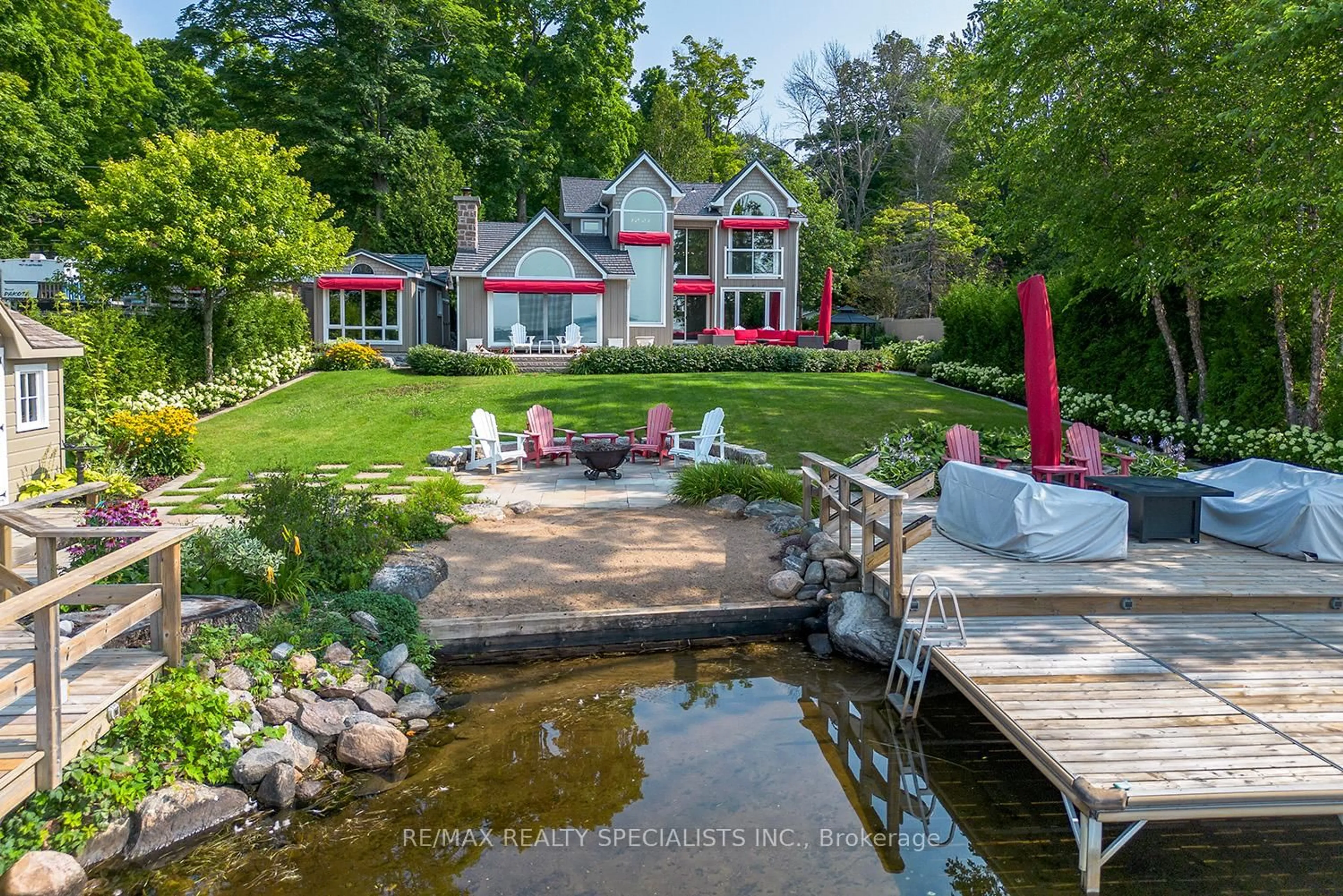 A pic from outside/outdoor area/front of a property/back of a property/a pic from drone, water/lake/river/ocean view for 127 Driftwood Village Rd, Kawartha Lakes Ontario K0M 1K0