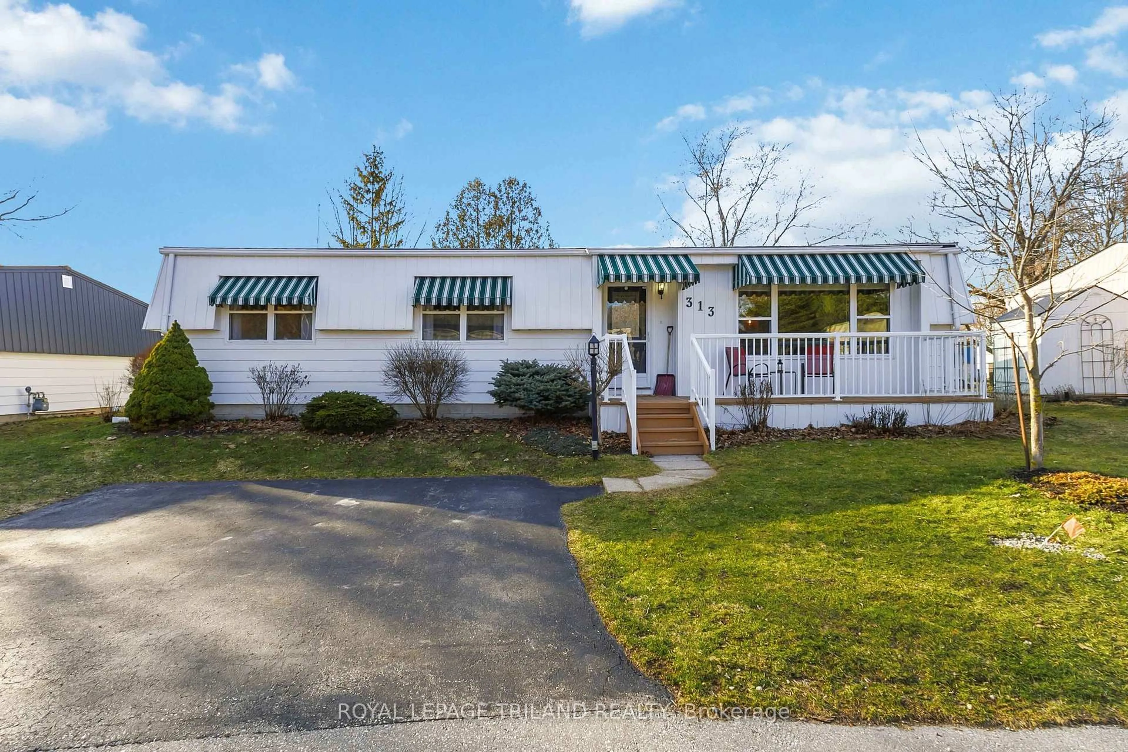 Home with vinyl exterior material, street for 313 Pinetree Lane, South Huron Ontario N0M 1T0