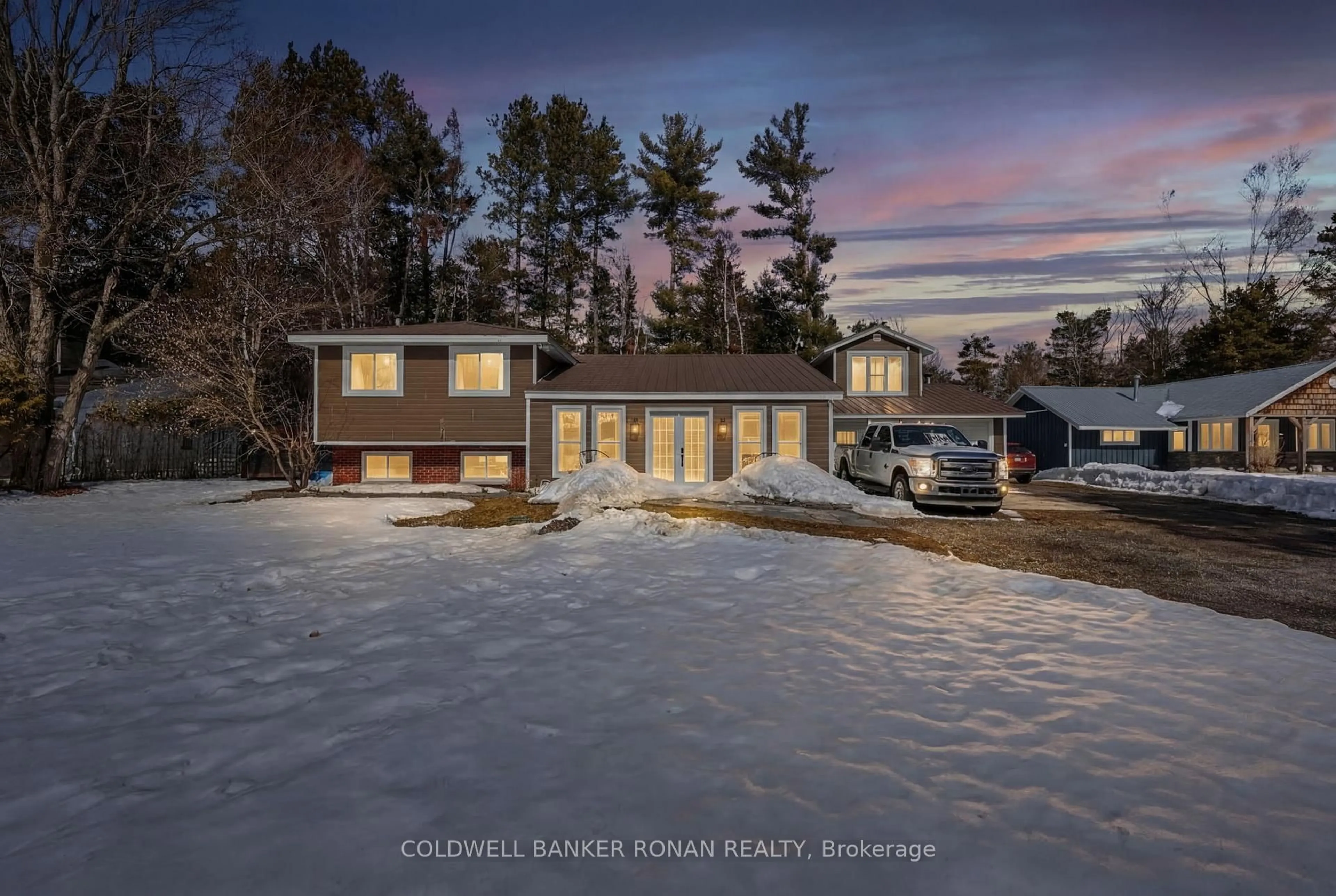 A pic from outside/outdoor area/front of a property/back of a property/a pic from drone, unknown for 363 Santas Village Rd, Bracebridge Ontario P1L 1W8