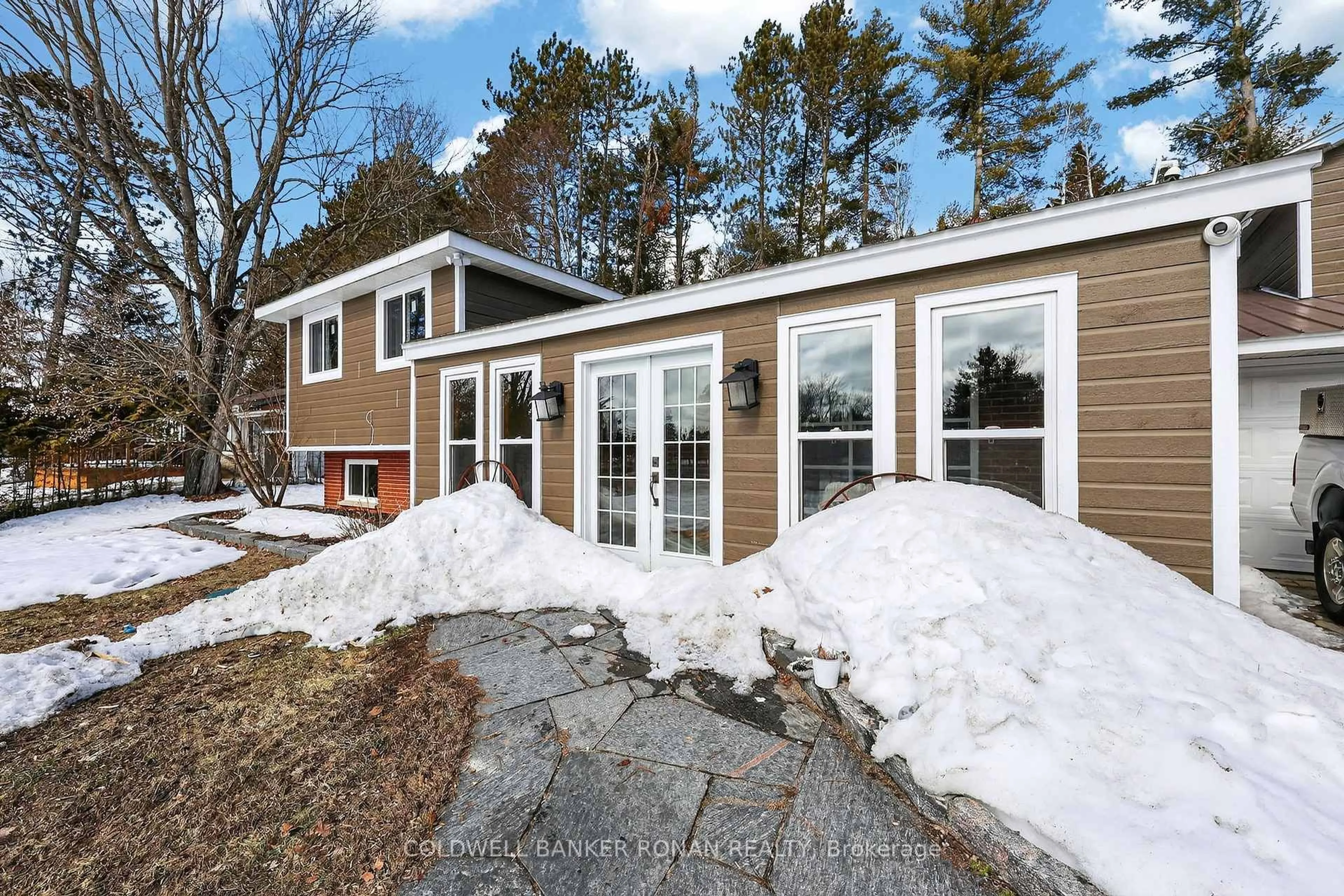 Home with vinyl exterior material, street for 363 Santas Village Rd, Bracebridge Ontario P1L 1W8