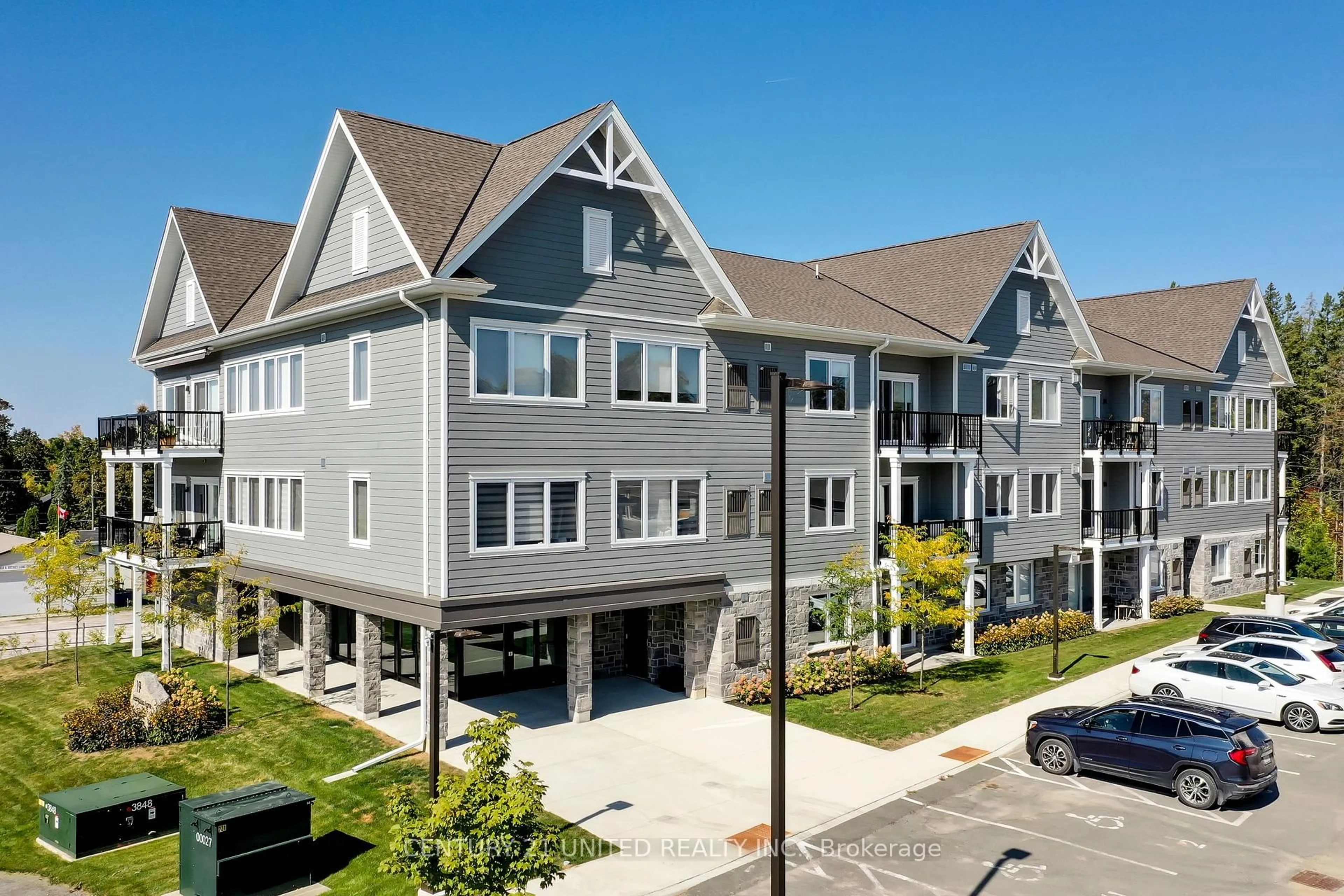 A pic from outside/outdoor area/front of a property/back of a property/a pic from drone, unknown for 19 Hampton Lane #202, Selwyn Ontario K0L 2H0