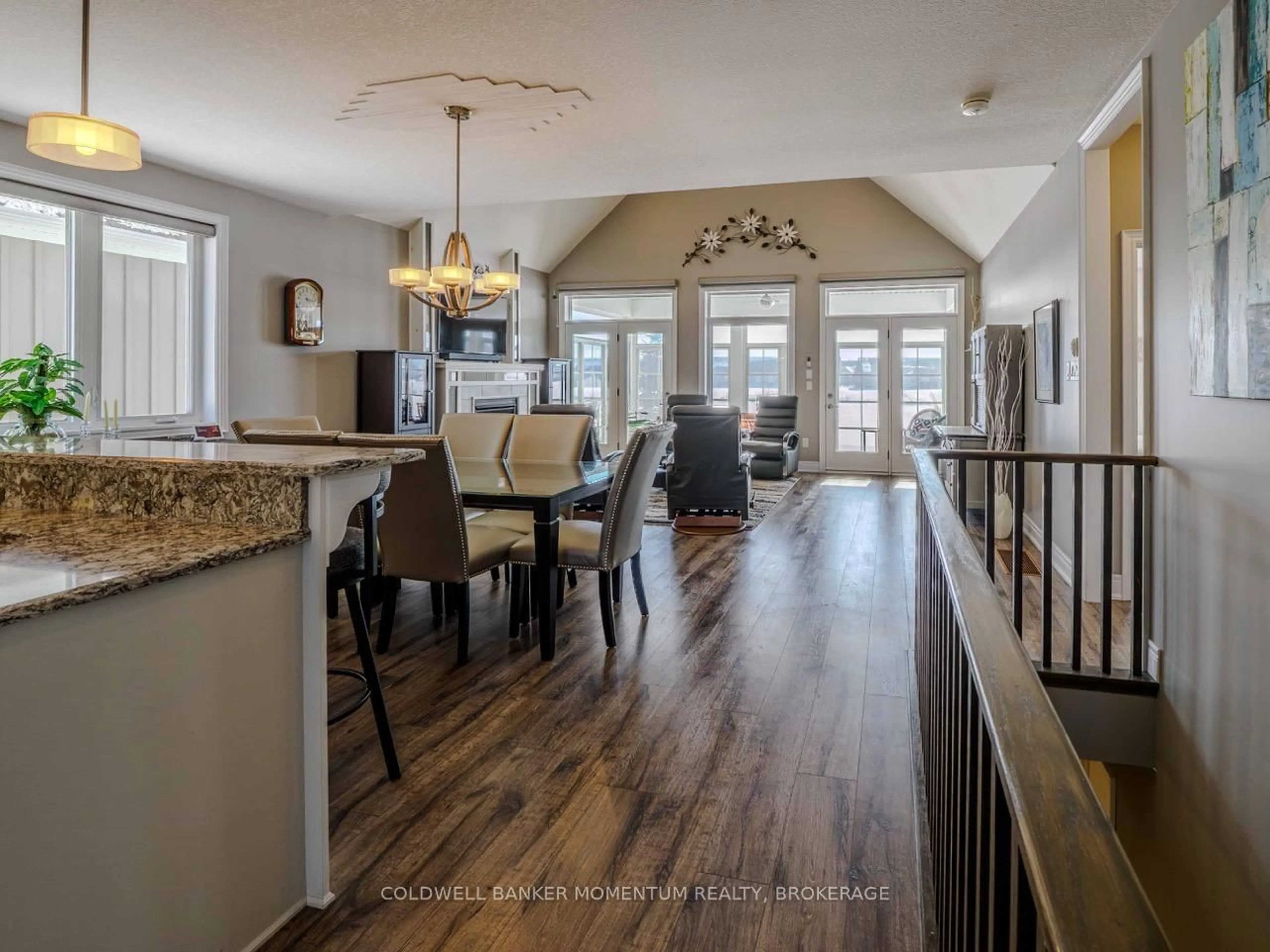 Open concept kitchen, wood/laminate floor for 172 Schooner Dr, Norfolk Ontario N0A 1N3