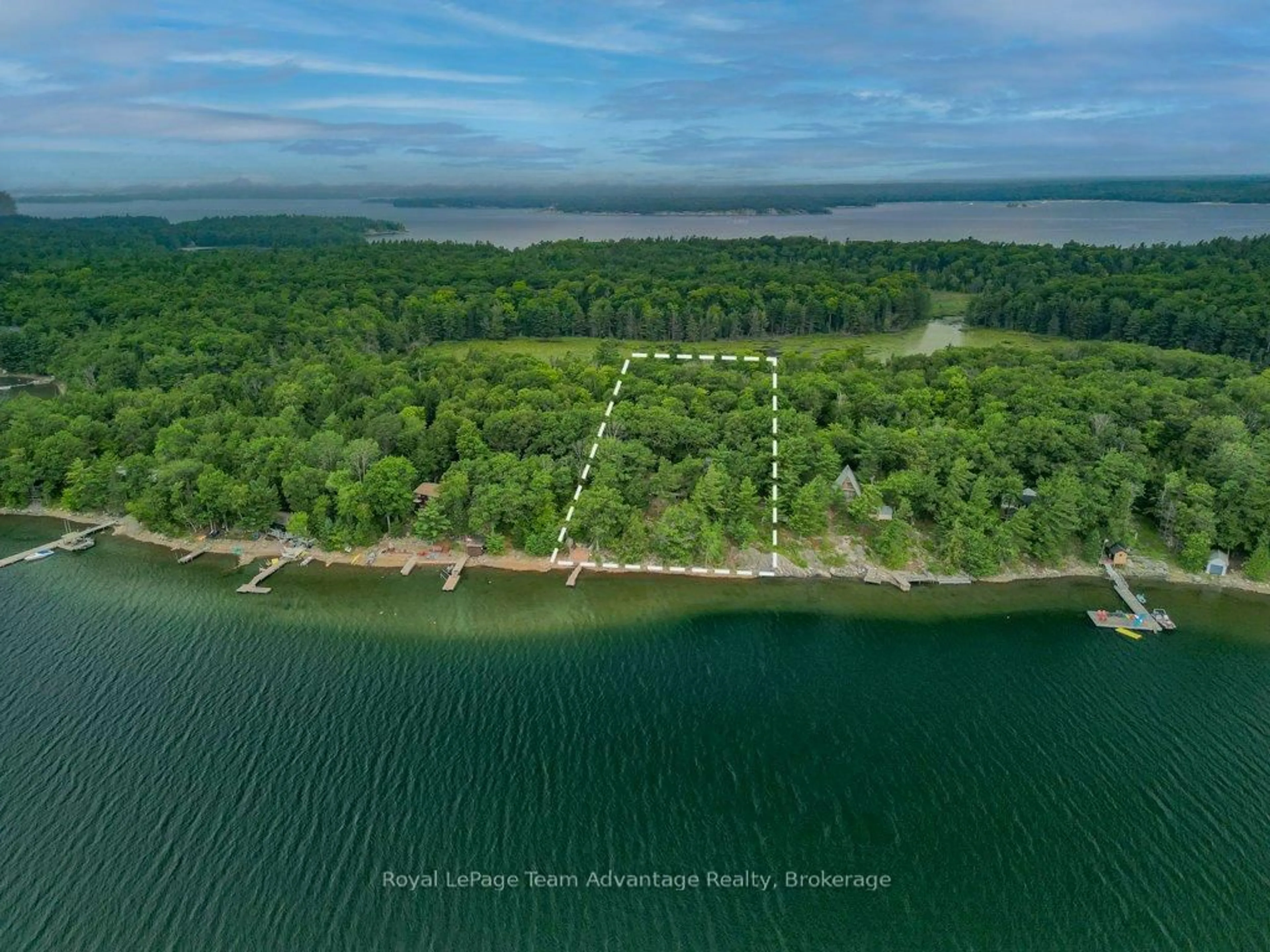 A pic from outside/outdoor area/front of a property/back of a property/a pic from drone, water/lake/river/ocean view for 32 Island 65c, Carling Ontario P0G 1G0