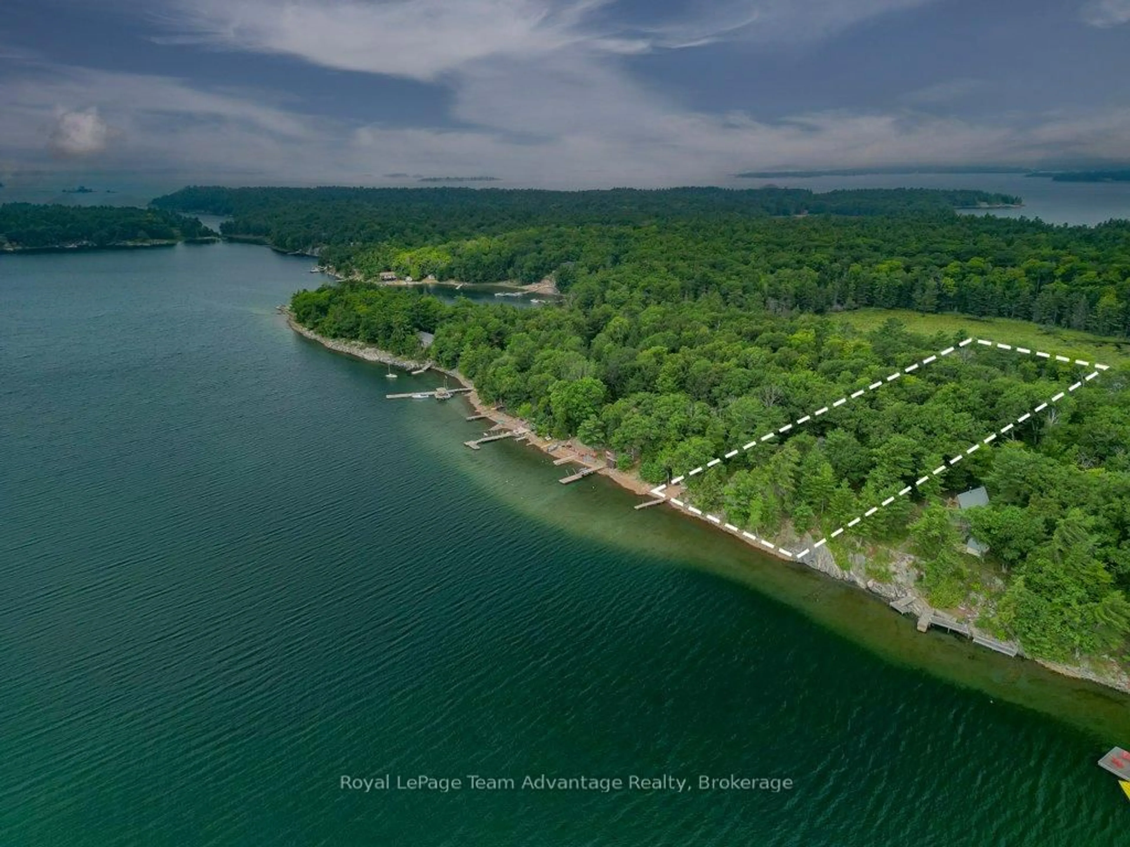 A pic from outside/outdoor area/front of a property/back of a property/a pic from drone, water/lake/river/ocean view for 32 Island 65c, Carling Ontario P0G 1G0