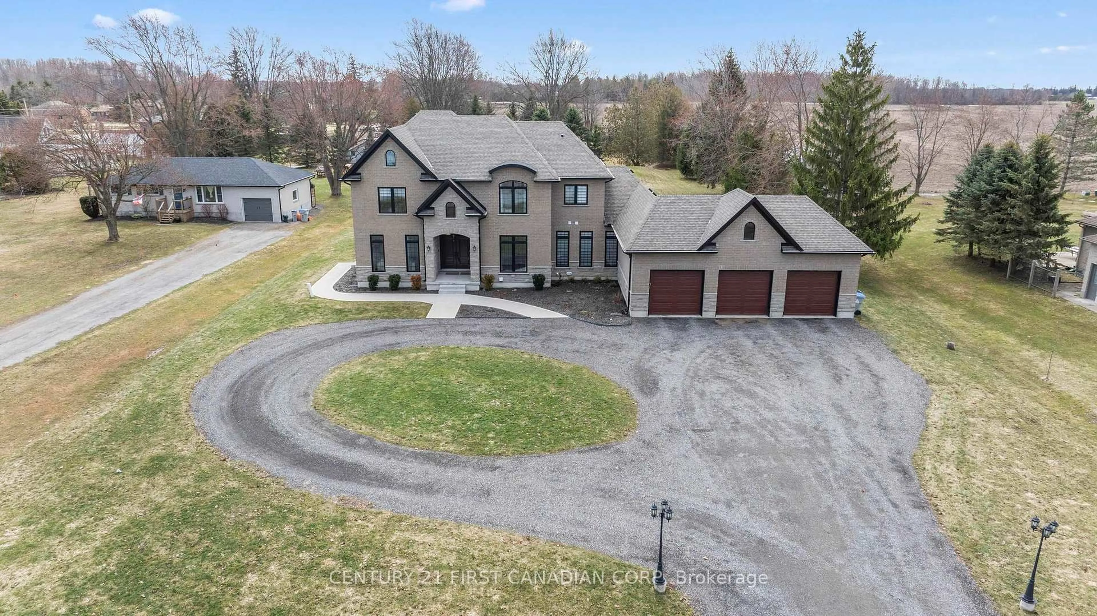 A pic from outside/outdoor area/front of a property/back of a property/a pic from drone, street for 15257 Twelve Mile Rd, Middlesex Centre Ontario N0M 2A0