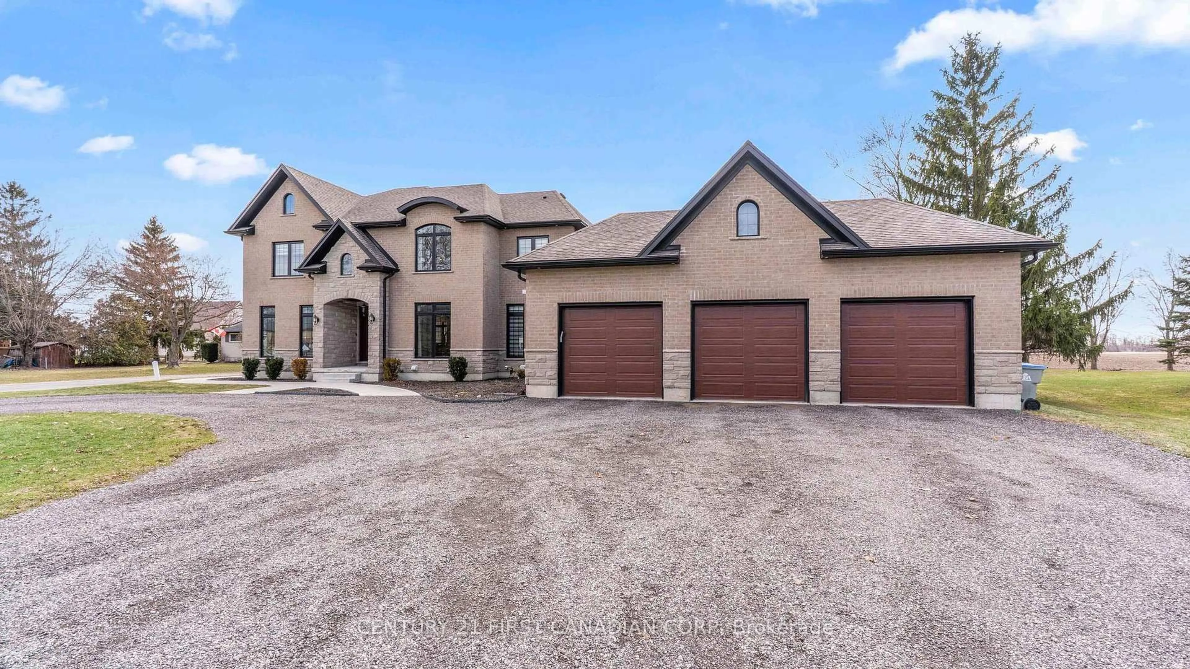 Home with brick exterior material, street for 15257 Twelve Mile Rd, Middlesex Centre Ontario N0M 2A0