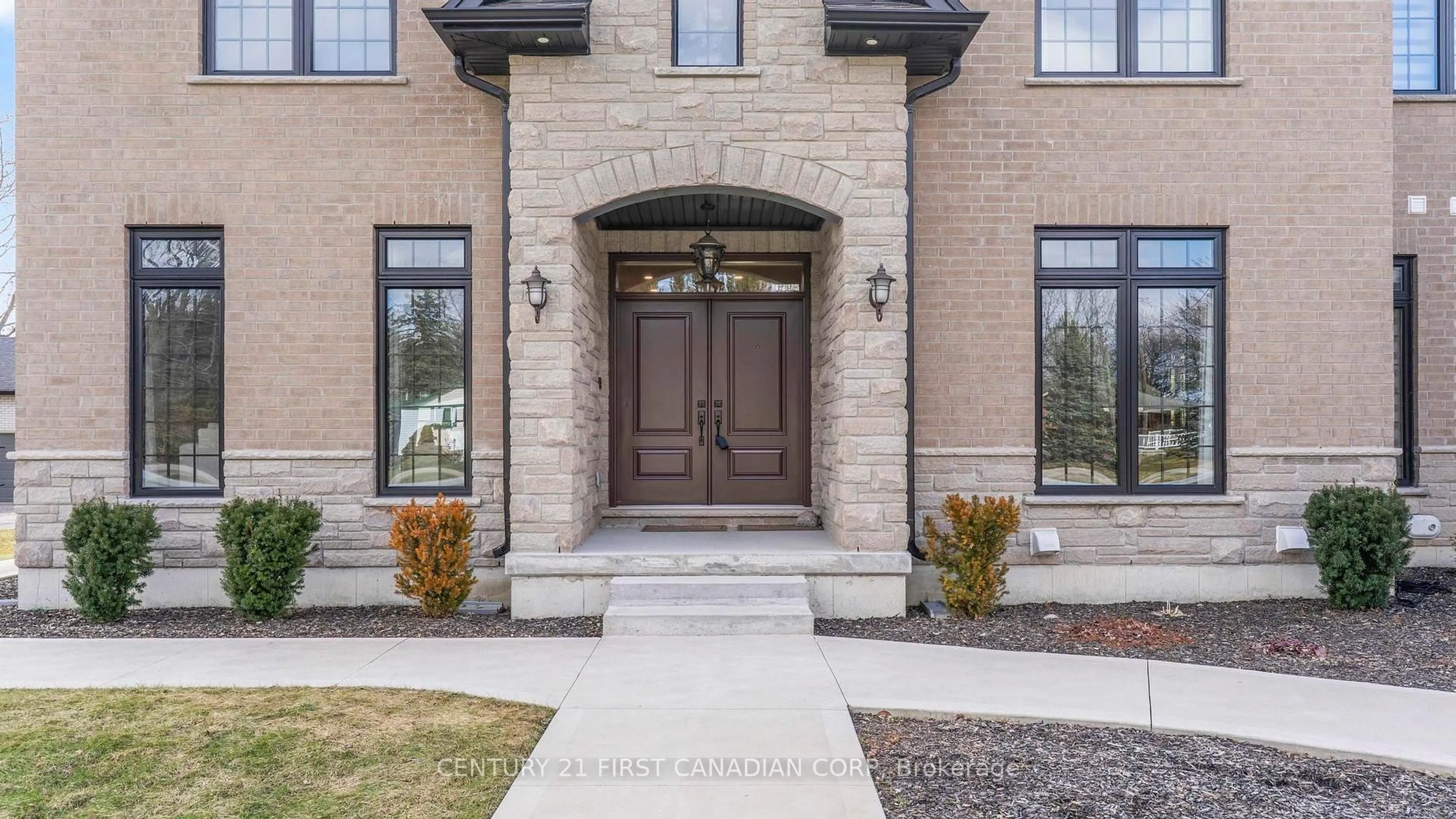 Home with brick exterior material, street for 15257 Twelve Mile Rd, Middlesex Centre Ontario N0M 2A0