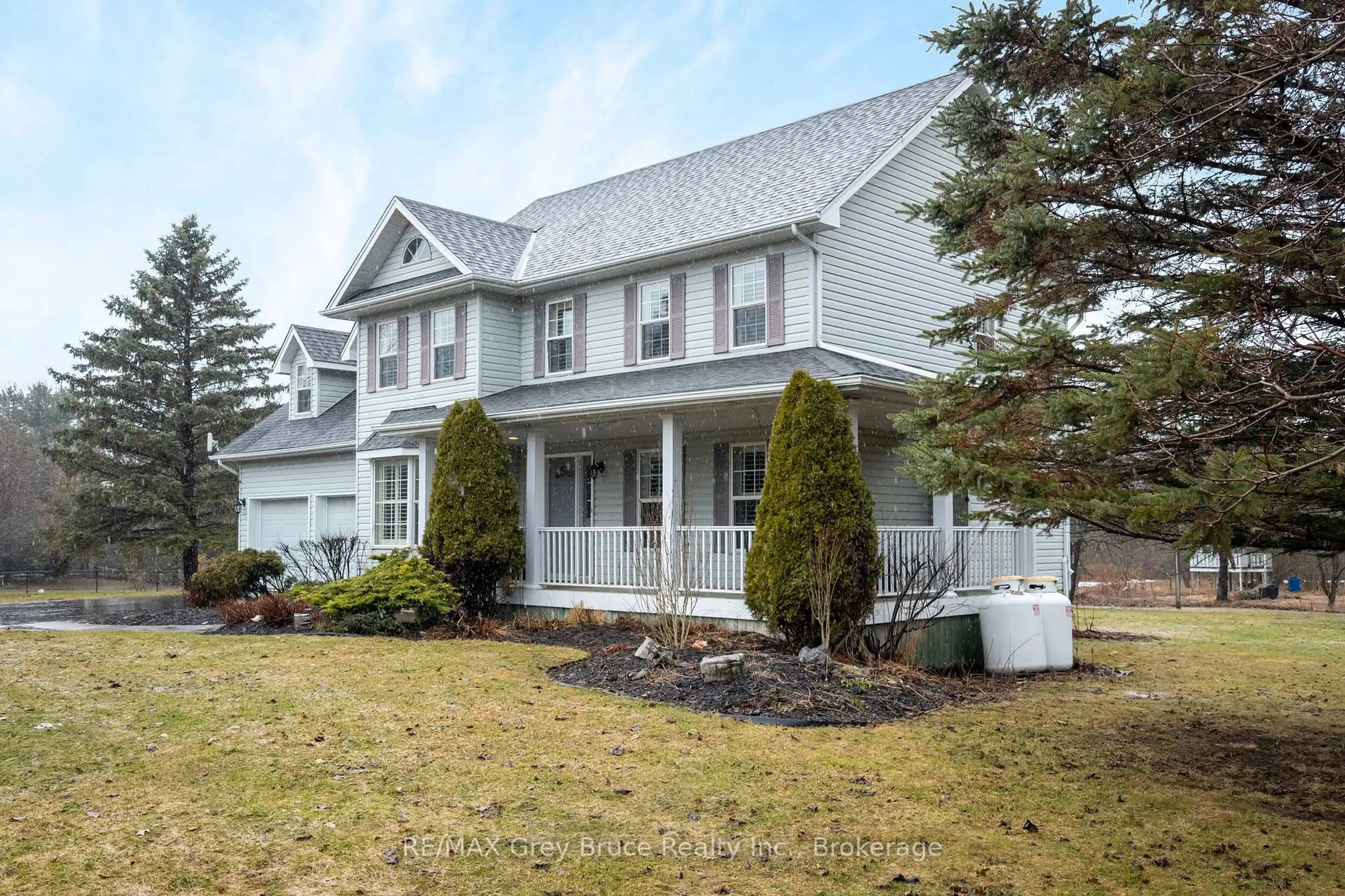 Home with vinyl exterior material, street for 243009 21 Sdrd, Meaford Ontario N4K 5N3