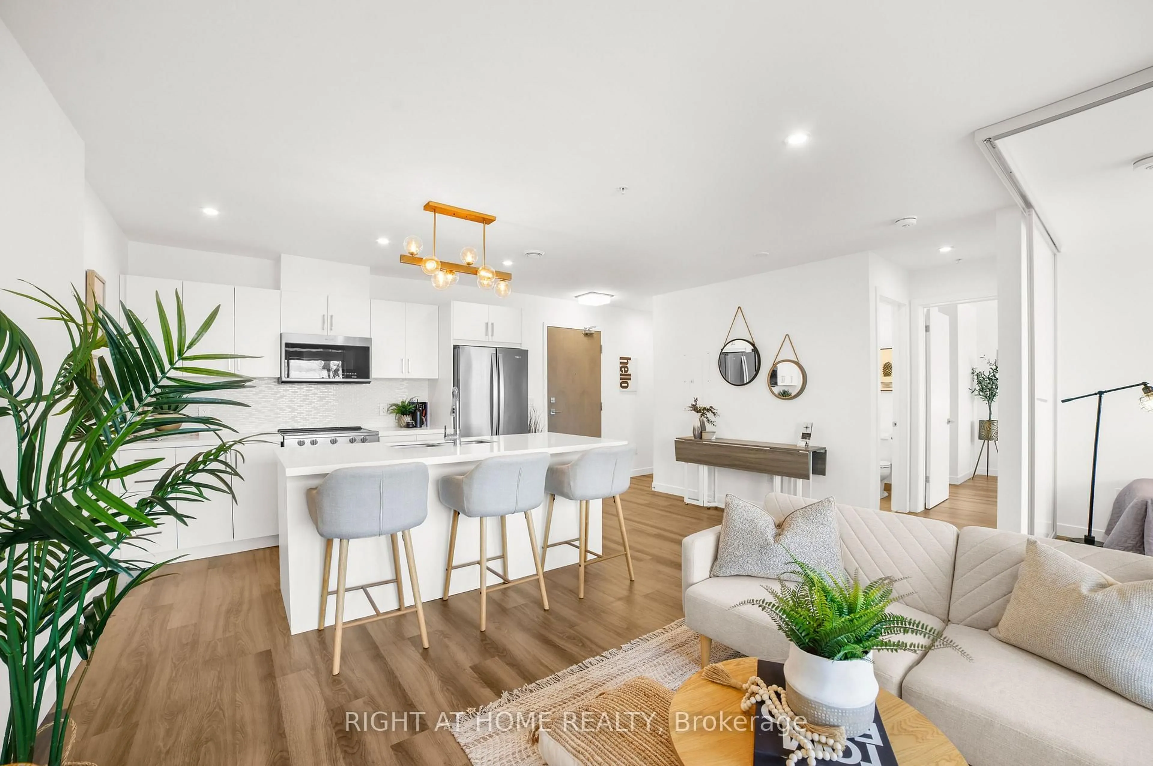 Open concept kitchen, wood/laminate floor for 479 CHARLTON Ave #205, Hamilton Ontario L8N 0B4