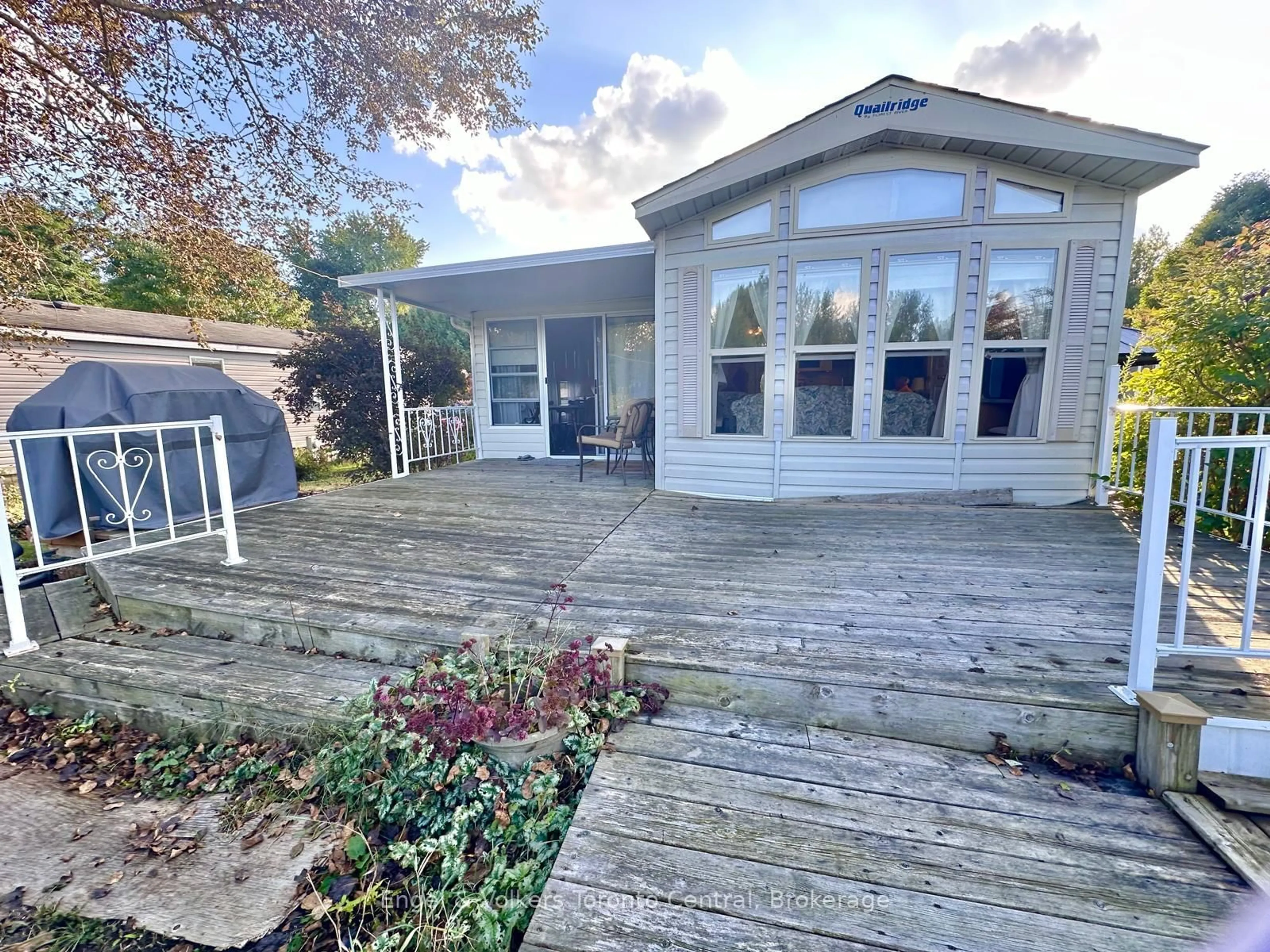 A pic from outside/outdoor area/front of a property/back of a property/a pic from drone, water/lake/river/ocean view for 7489 SIDEROAD 5 #B6, Wellington North Ontario N0G 2L0