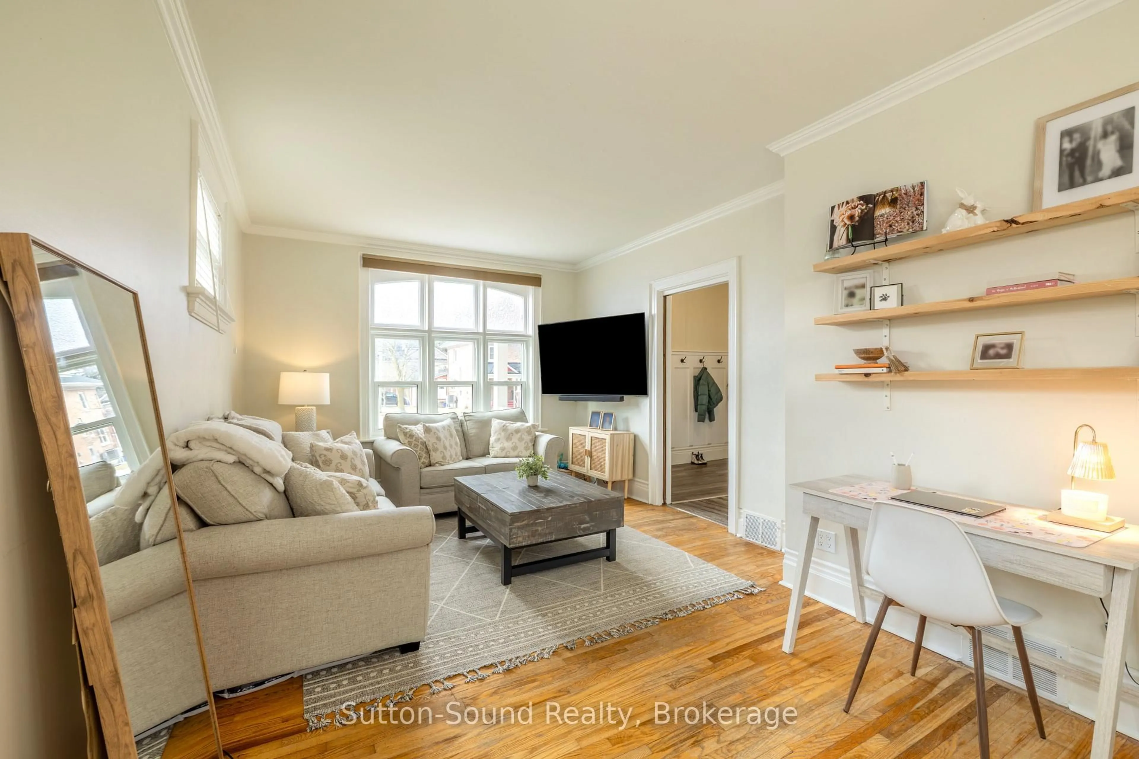 Living room with furniture, wood/laminate floor for 425 2nd Ave, Owen Sound Ontario N4K 2G2