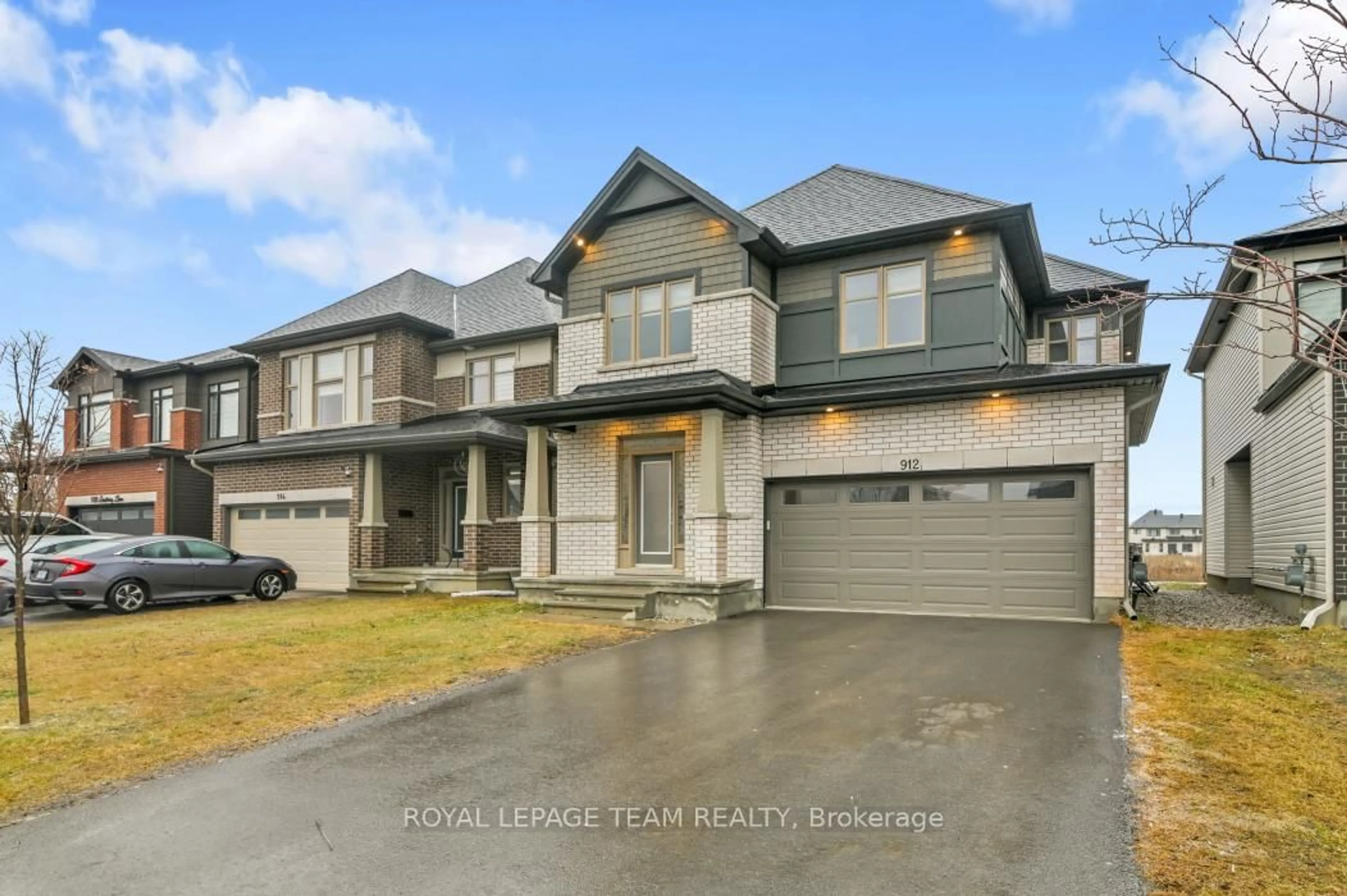 Home with brick exterior material, street for 912 Duxbury Lane, Ottawa Ontario K4M 0M2